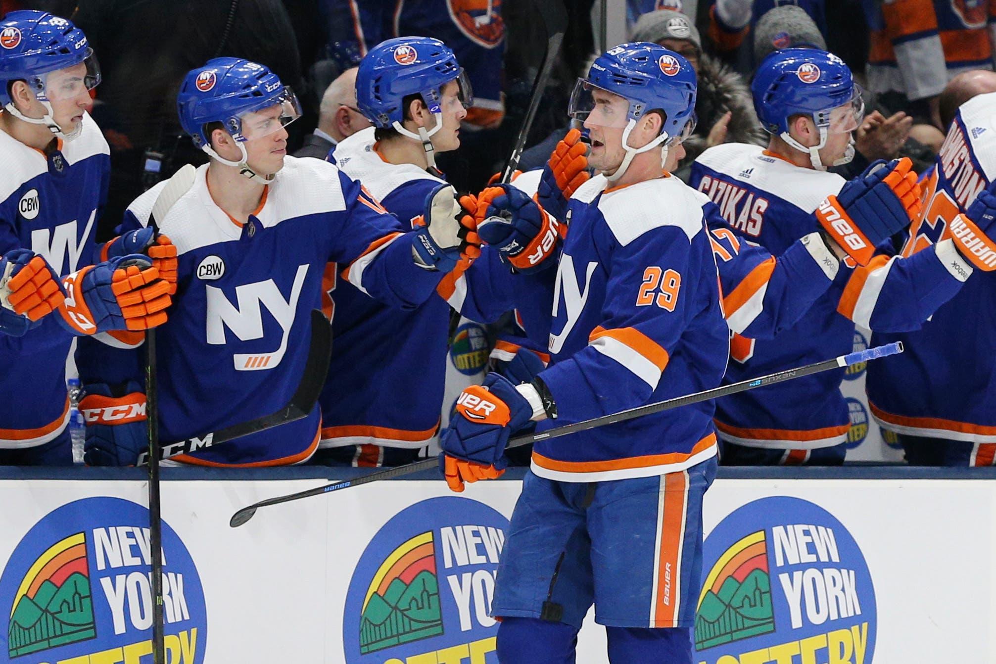 Mar 5, 2019; Uniondale, NY, USA; New York Islanders center Brock Nelson (29) celebrates his goal against the Ottawa Senators with teammates during the first period at Nassau Veterans Memorial Coliseum. Mandatory Credit: Brad Penner-USA TODAY Sports / Brad Penner