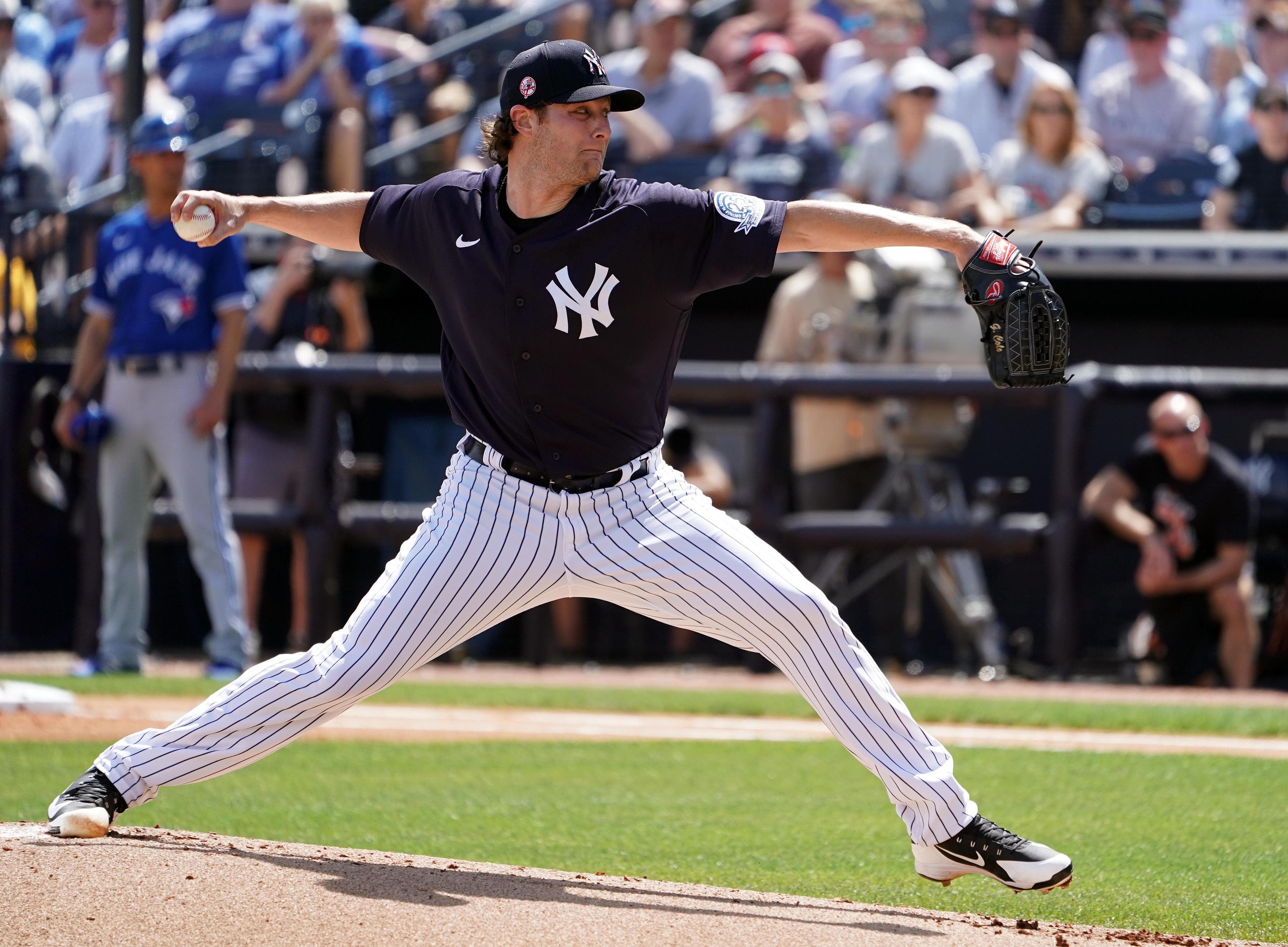 Mar 10, 2020; Tampa, Florida, USA; New York Yankees starting pitcher Gerrit Cole (45) pitching against the Toronto Blue Jays during the first inning at George M. Steinbrenner Field. Mandatory Credit: John David Mercer-USA TODAY Sports / John David Mercer