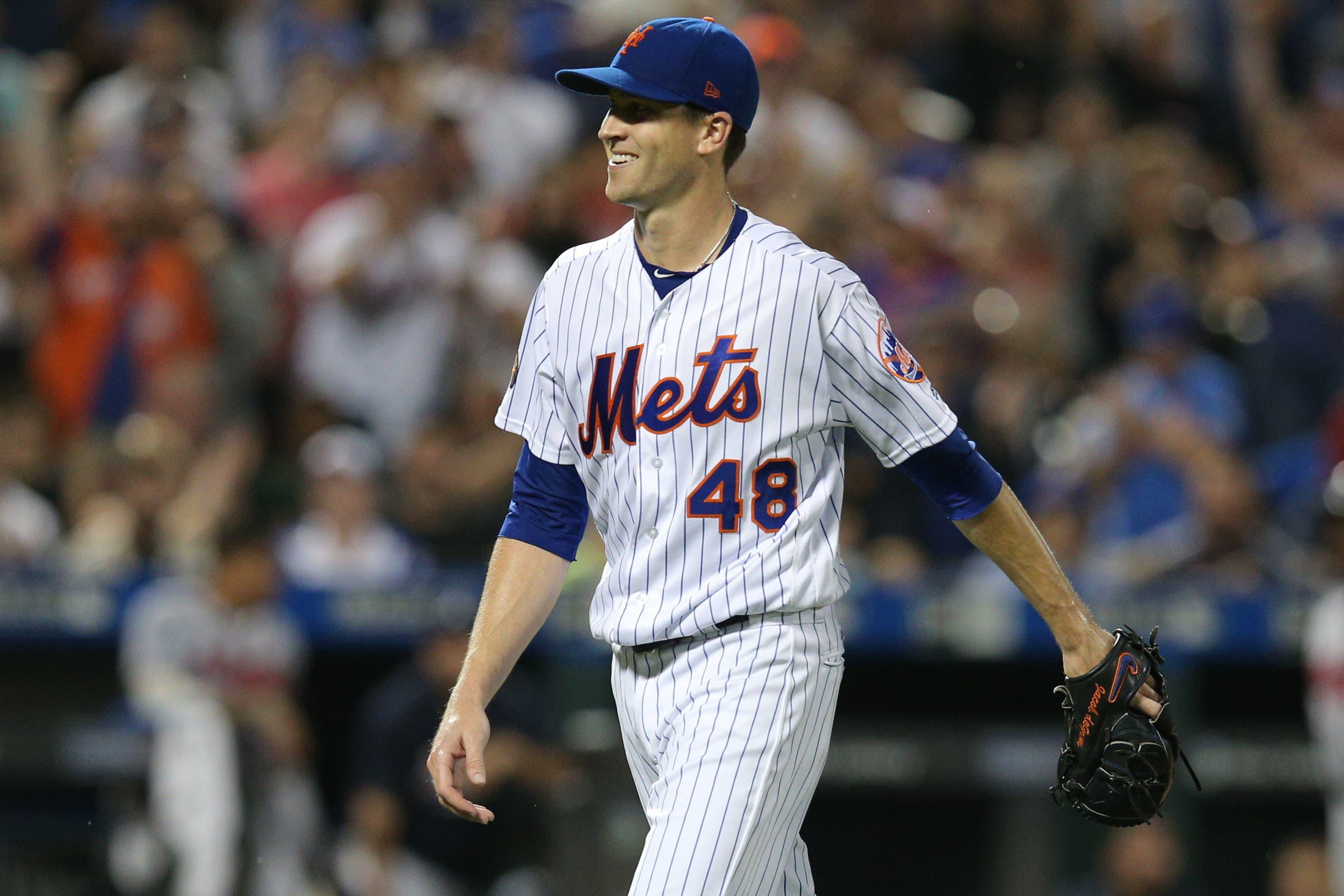 Sep 26, 2018; New York City, NY, USA; New York Mets starting pitcher Jacob deGrom (48) reacts after the top of the eighth inning against the Atlanta Braves at Citi Field. Mandatory Credit: Brad Penner-USA TODAY Sports / Brad Penner