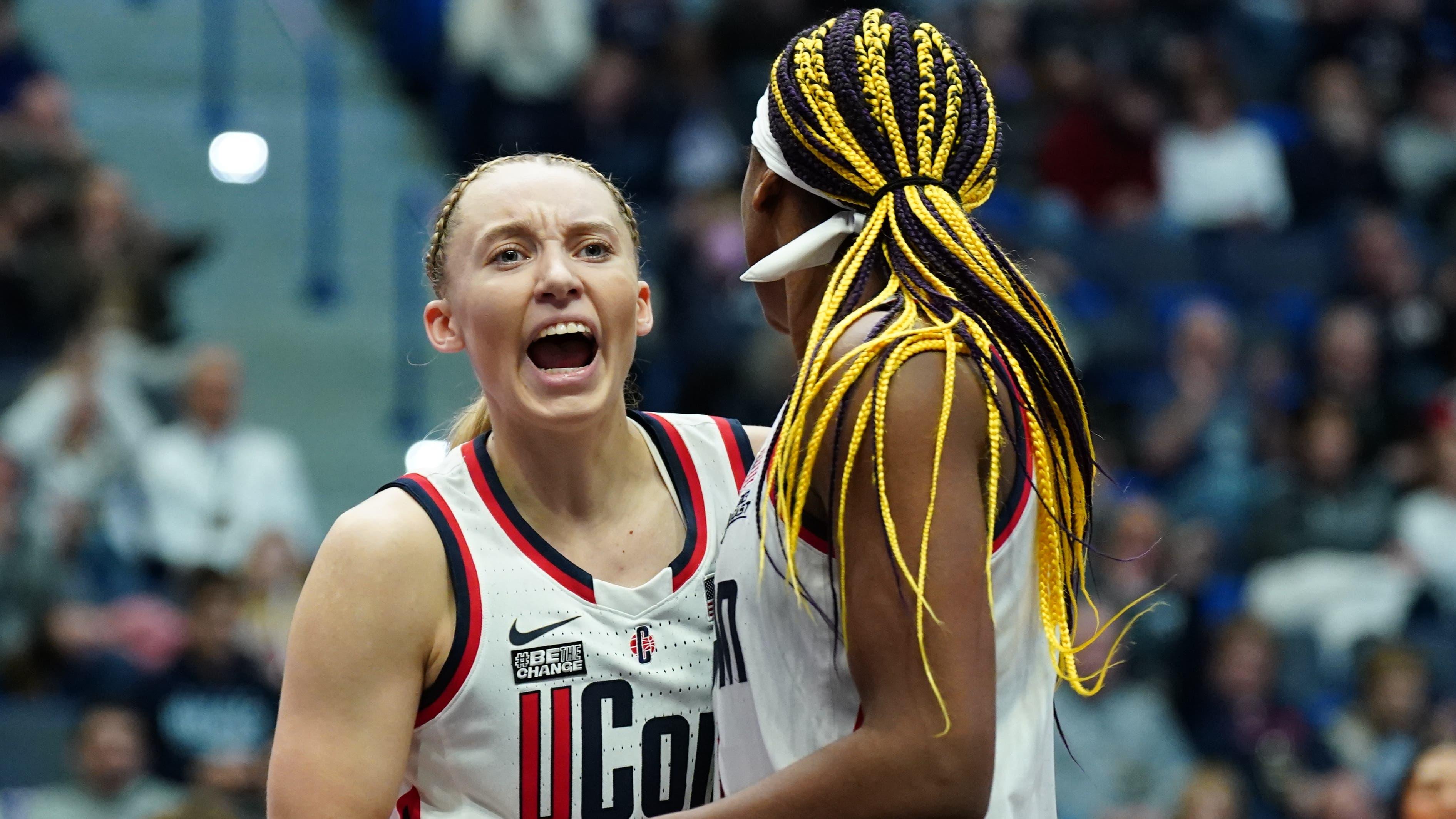 UConn Huskies guard Paige Bueckers (5) reacts after a play against the Louisville Cardinals in the first half at XL Center / David Butler II - USA TODAY