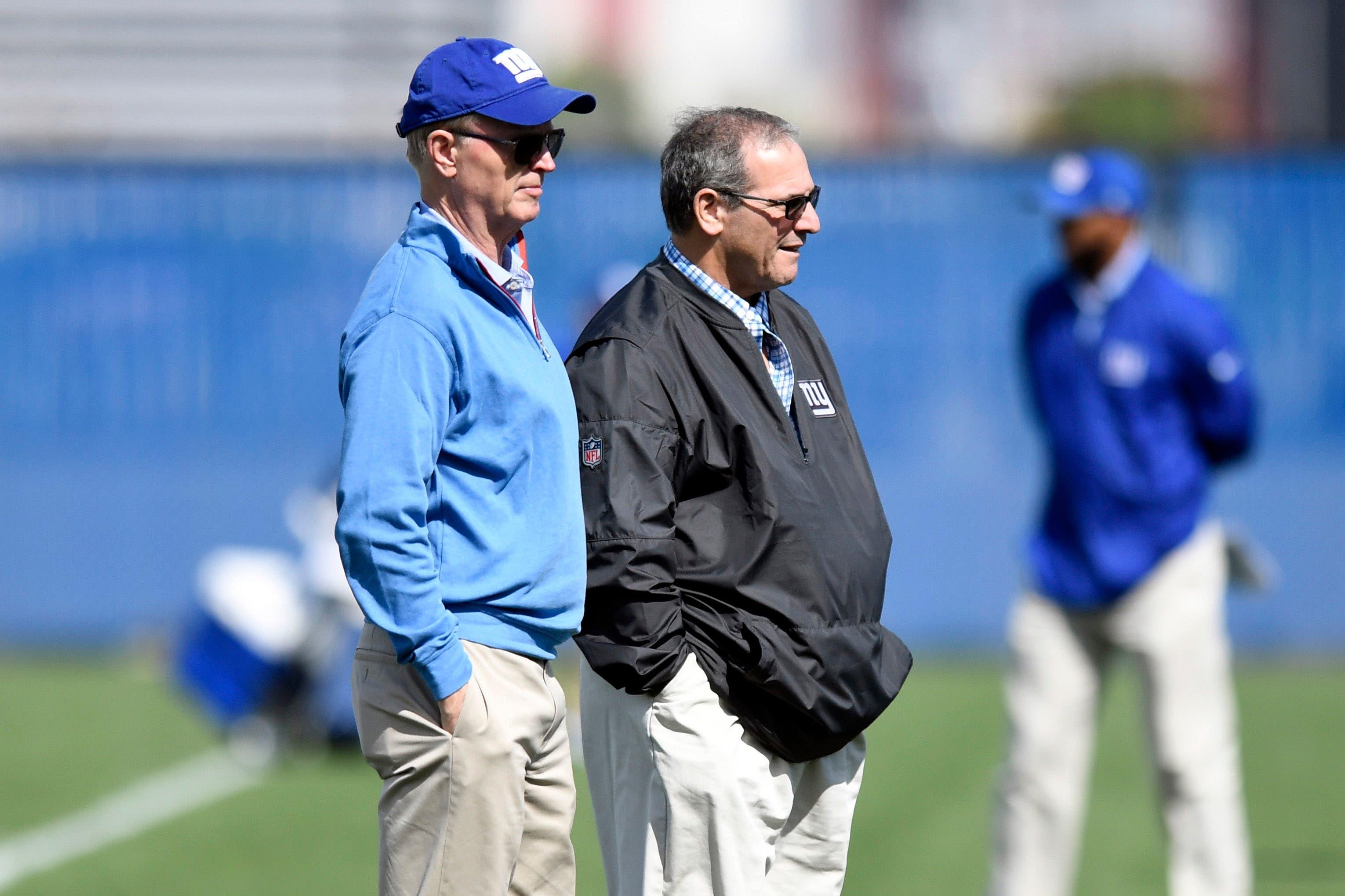 May 11, 2018; East Rutherford, NJ, USA; New York Giants owner John Mara (left) and general manager Dave Gettleman on the field during rookie minicamp at Quest Diagnostics Training Center on Friday. Mandatory Credit: Danielle Parhizkaran-USA TODAY SPORTS / Danielle Parhizkaran