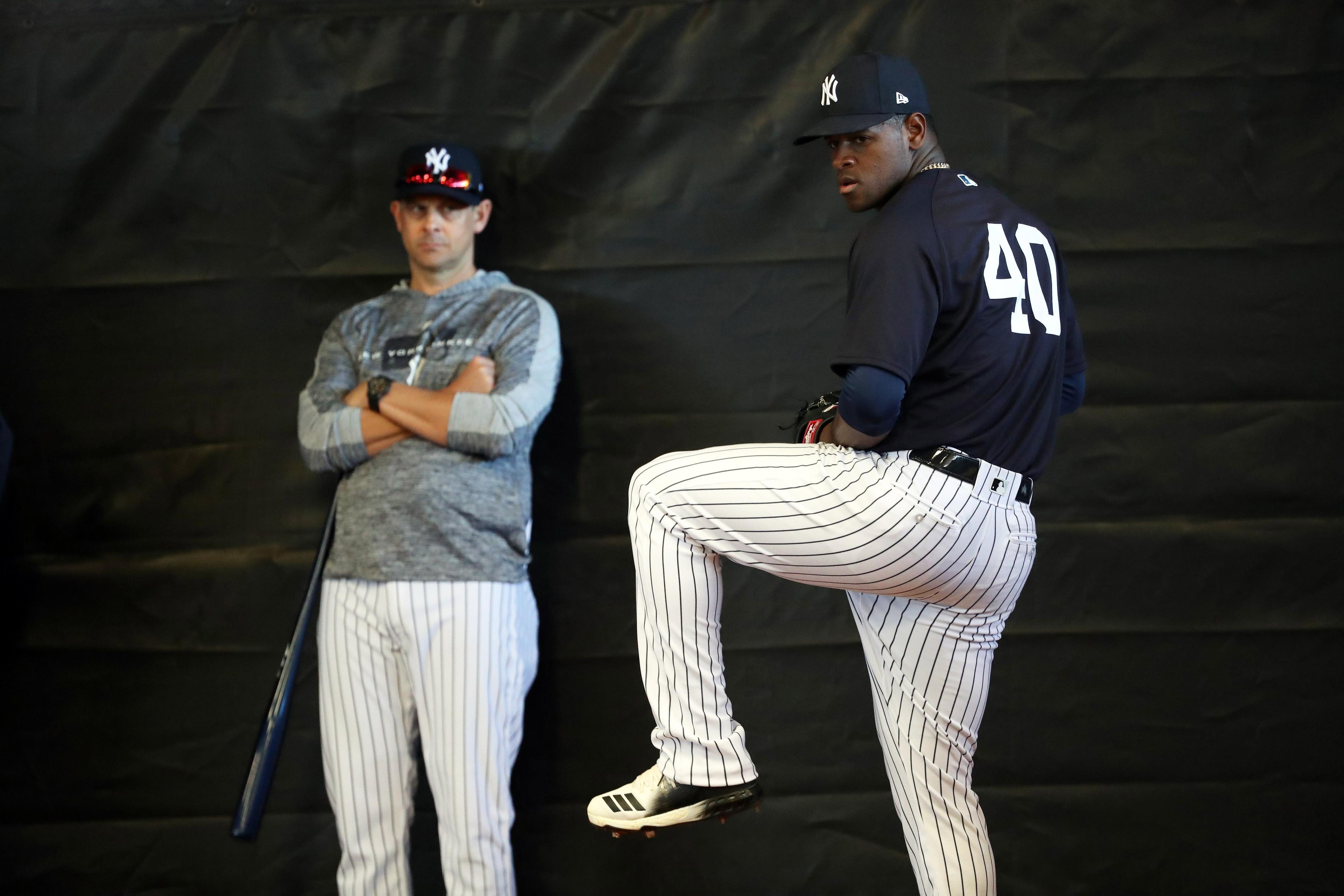 Feb 14, 2019; Tampa, FL, USA;New York Yankees starting pitcher Luis Severino (40) throws a bullpen session as manager Aaron Boone (17) looks on during spring training at George M. Steinbrenner Field. Mandatory Credit: Kim Klement-USA TODAY Sports / Kim Klement