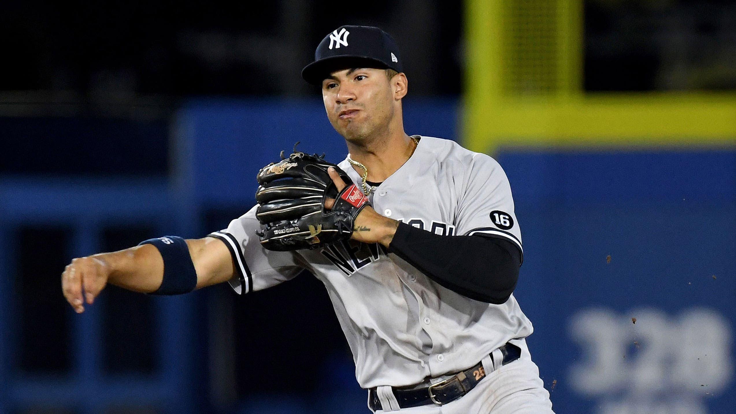 Apr 12, 2021; Dunedin, Florida, CAN; New York Yankees infielder Gleyber Torres (25) throws to first base against the Toronto Blue Jays in the sixth inning at TD Ballpark. / Jonathan Dyer-USA TODAY Sports