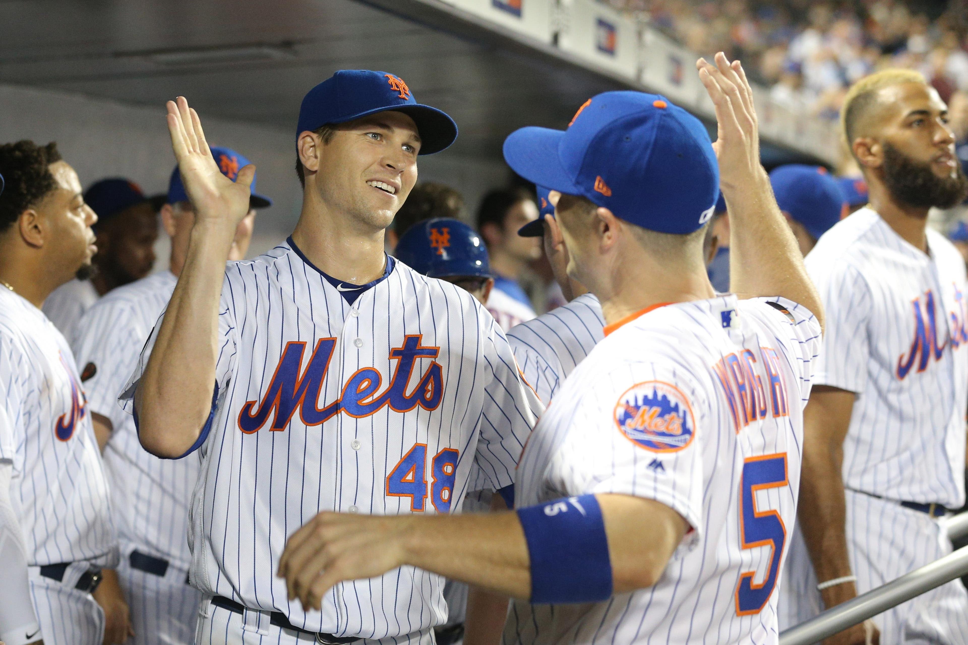 Sep 26, 2018; New York City, NY, USA; New York Mets starting pitcher Jacob deGrom (48) celebrates with New York Mets third baseman David Wright (5) during the eighth inning against the Atlanta Braves at Citi Field. Mandatory Credit: Brad Penner-USA TODAY Sports / Brad Penner