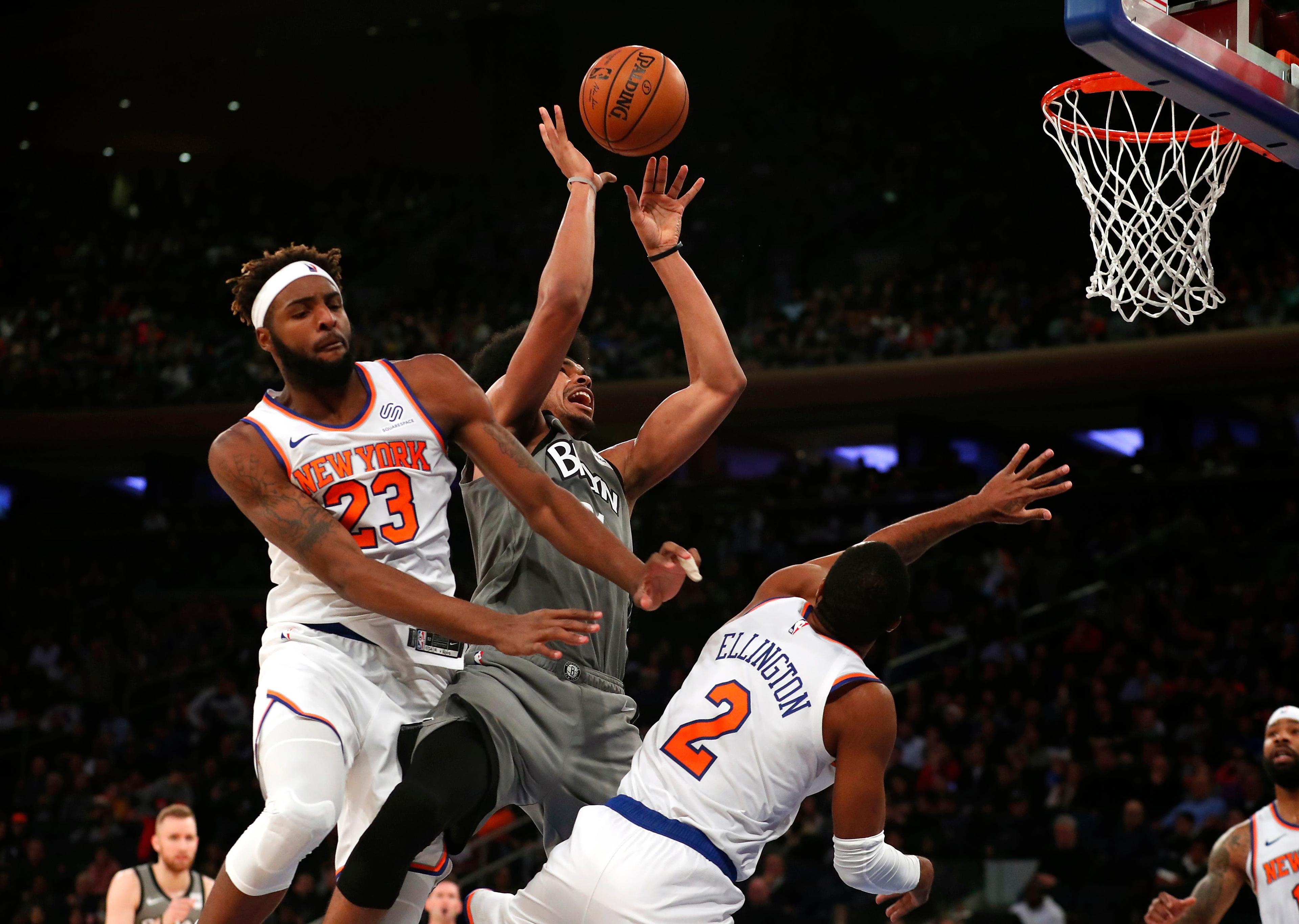 Nov 24, 2019; New York, NY, USA; New York Knicks center Mitchell Robinson (23) fouls Brooklyn Nets center Jarrett Allen (31) during the second half at Madison Square Garden. Mandatory Credit: Noah K. Murray-USA TODAY Sports / Noah K. Murray