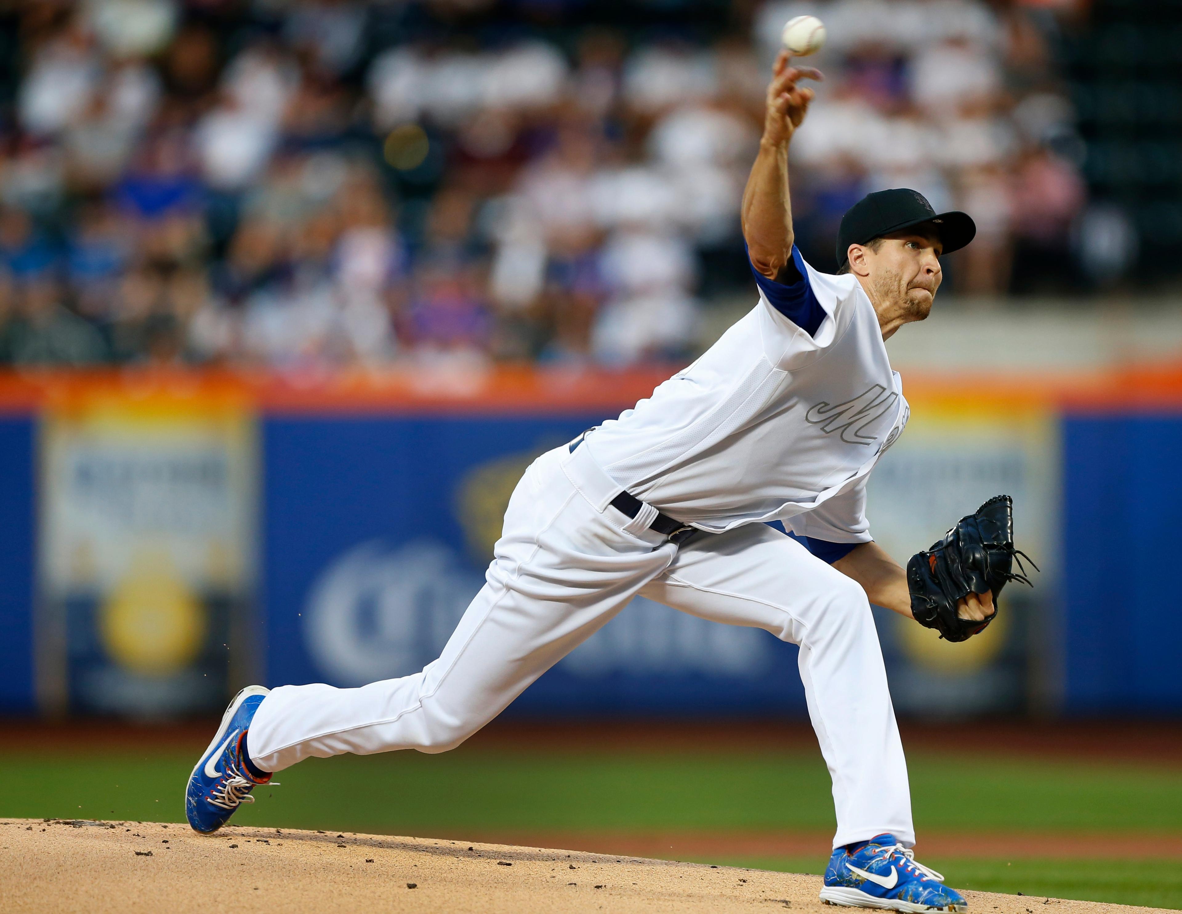 Aug 23, 2019; New York City, NY, USA; New York Mets starting pitcher Jacob deGrom (48) pitches in the first inning against the Atlanta Braves during an MLB Players' Weekend game at Citi Field. Mandatory Credit: Noah K. Murray-USA TODAY Sports