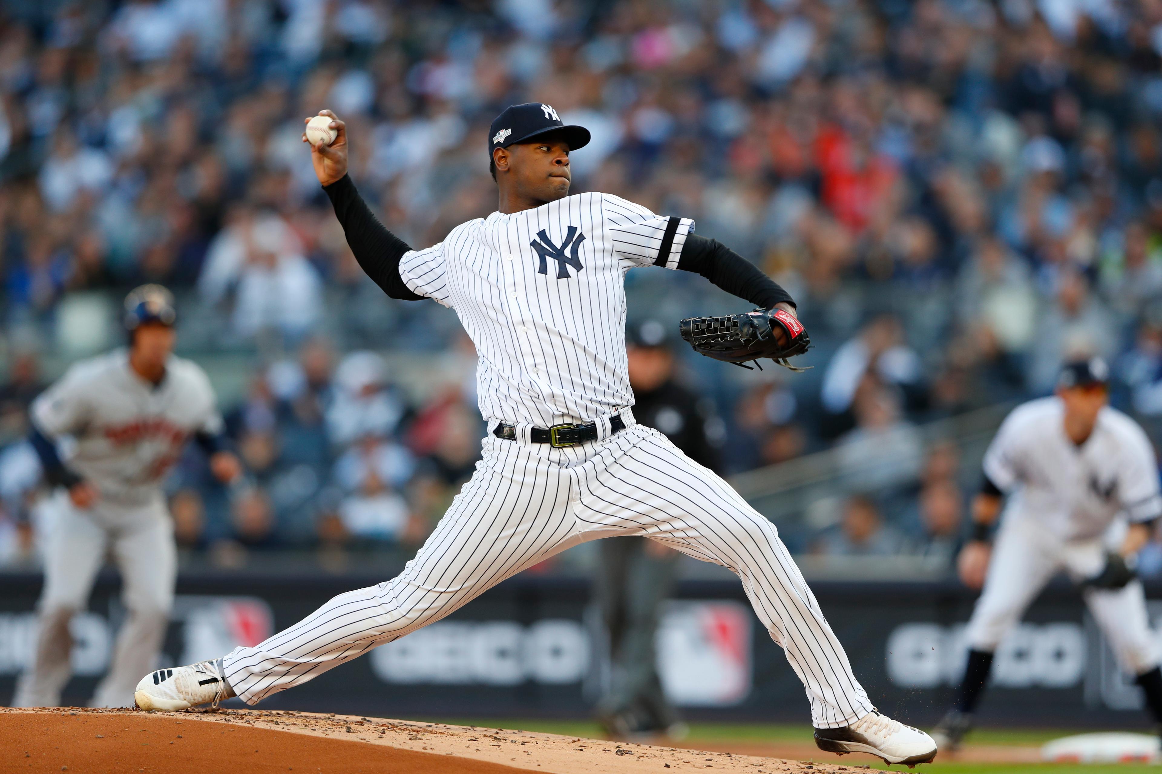 Oct 15, 2019; Bronx, NY, USA; New York Yankees starting pitcher Luis Severino (40) pitches against the Houston Astros during the first inning of game three of the 2019 ALCS playoff baseball series at Yankee Stadium. Mandatory Credit: Noah K. Murray-USA TODAY Sports