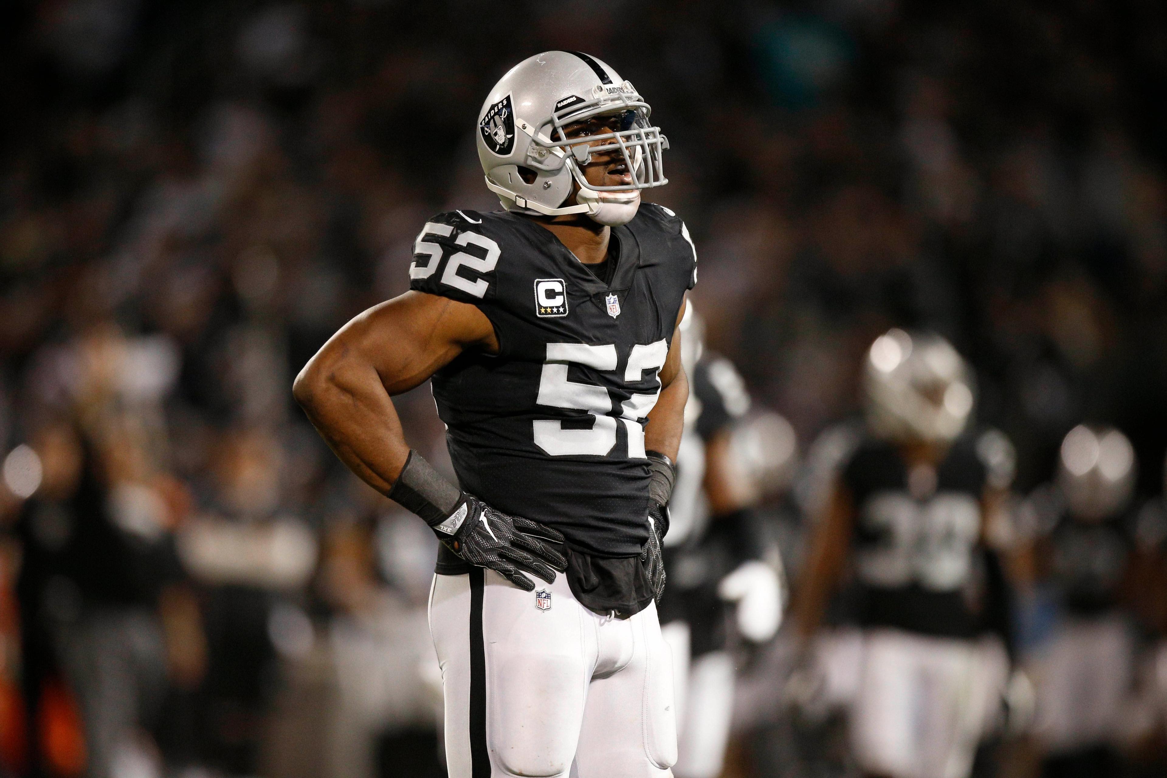 Dec 17, 2017; Oakland, CA, USA; Oakland Raiders defensive end Khalil Mack (52) stands on the field during a break in the action against the Dallas Cowboys in the second quarter at Oakland Coliseum. Mandatory Credit: Cary Edmondson-USA TODAY Sports / Cary Edmondson