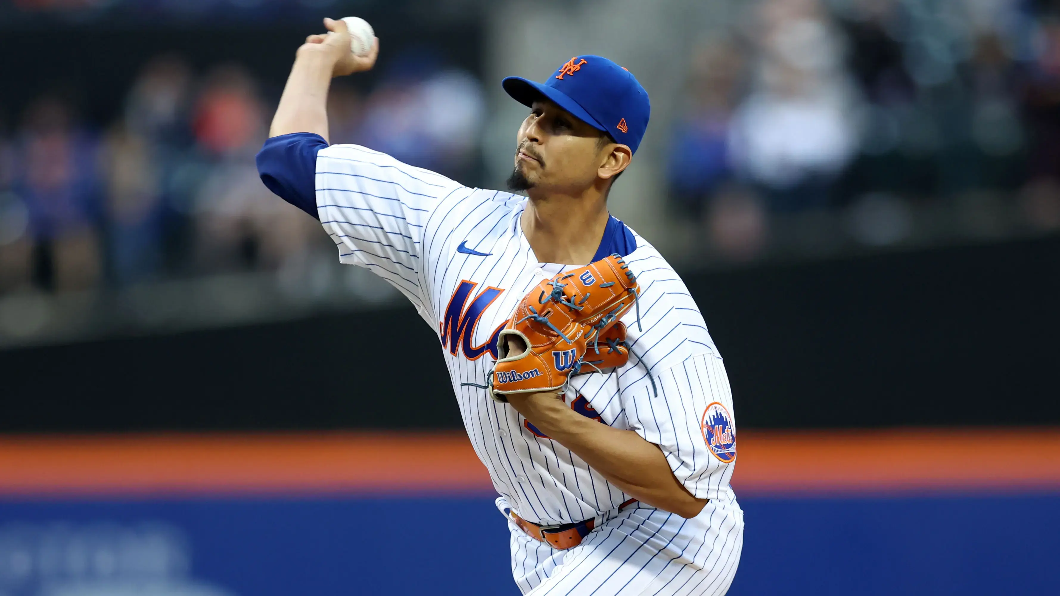 May 3, 2022; New York City, New York, USA; New York Mets starting pitcher Carlos Carrasco (59) pitches against the Atlanta Braves during the second inning at Citi Field. / Brad Penner-USA TODAY Sports