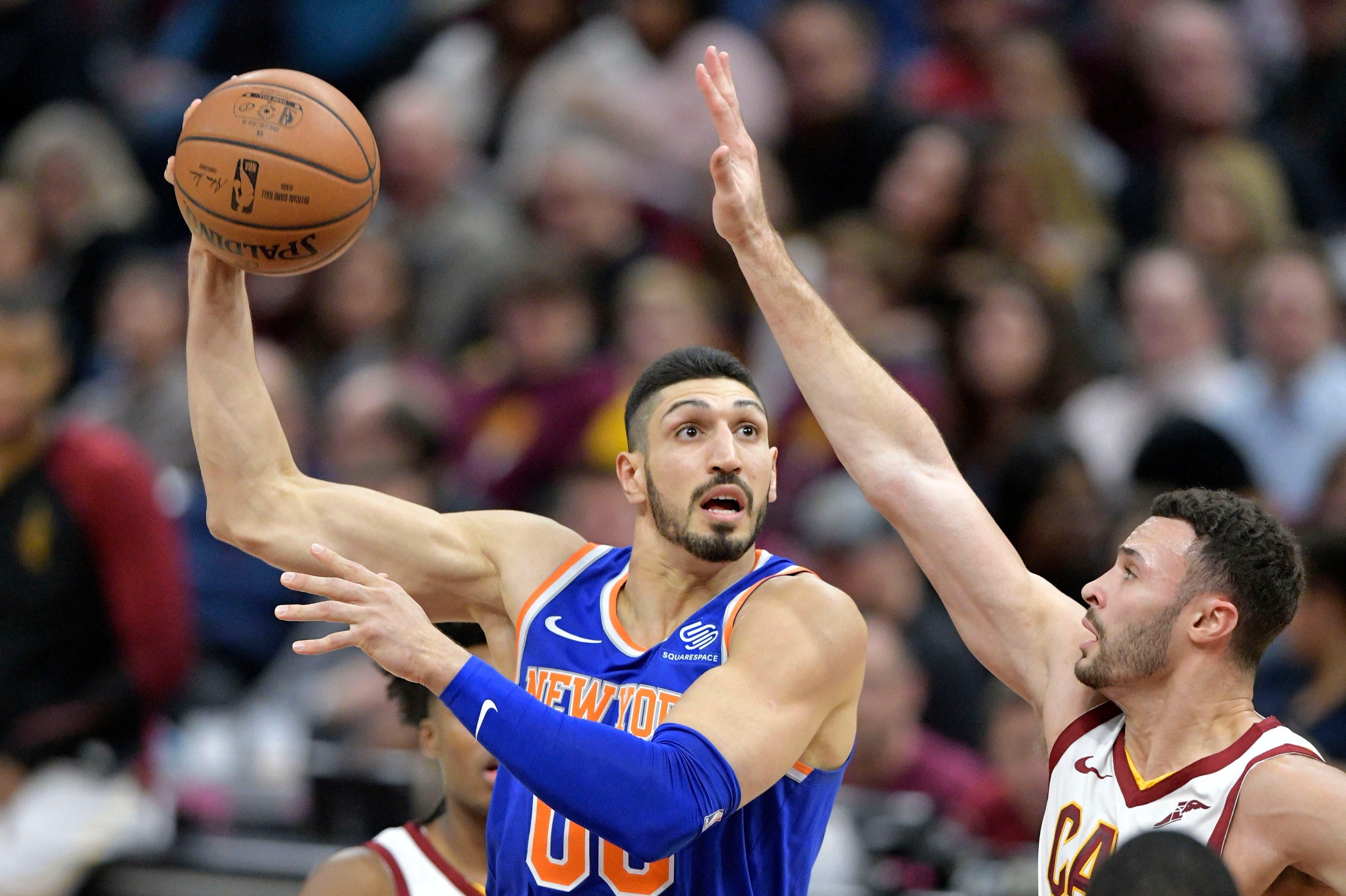 Dec 12, 2018; Cleveland, OH, USA; New York Knicks center Enes Kanter (00) shoots against Cleveland Cavaliers forward Larry Nance Jr. (22) in the second quarter at Quicken Loans Arena. Mandatory Credit: David Richard-USA TODAY Sports / David Richard