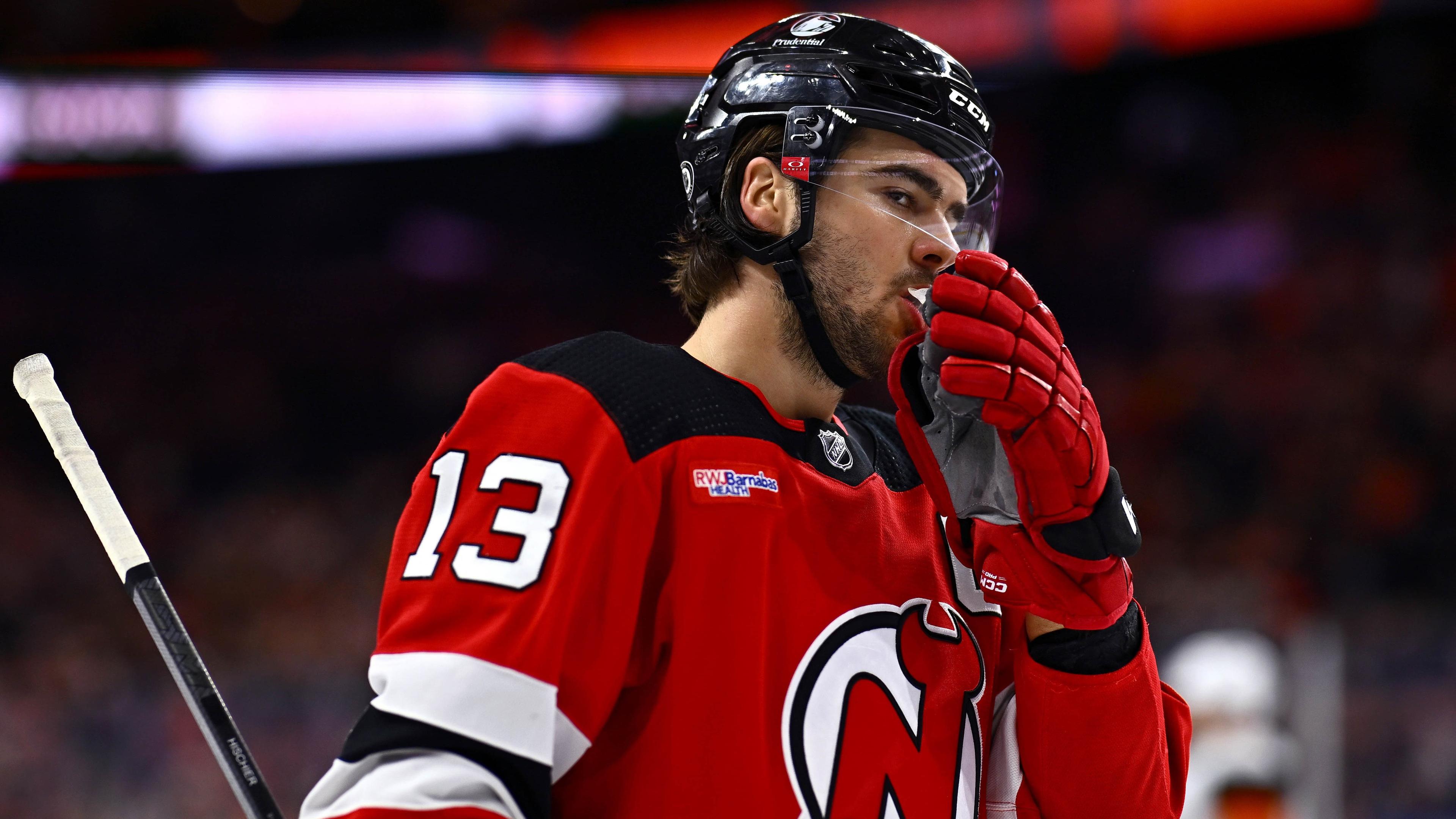 New Jersey Devils center Nico Hischier (13) looks on against the Philadelphia Flyers in the first period at Wells Fargo Center