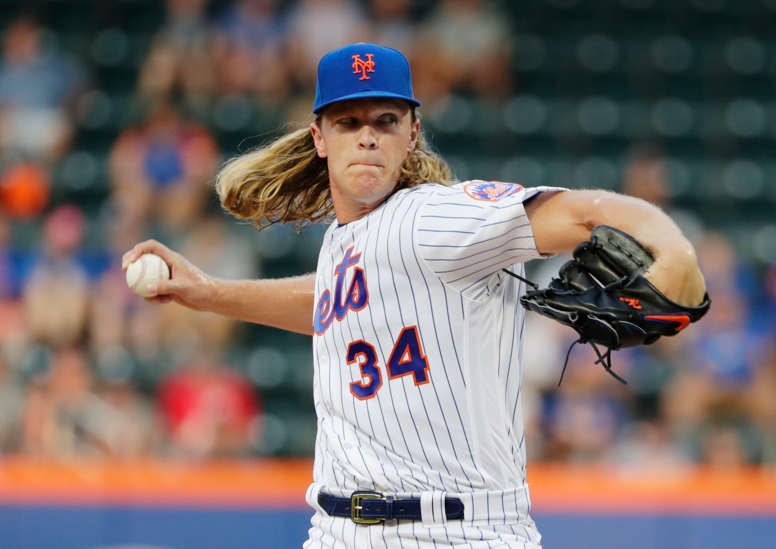 New York Mets' Noah Syndergaard (34) delivers a pitch during the first inning of a baseball game Monday, Aug. 6, 2018, in New York. (AP Photo/Frank Franklin II) / AP