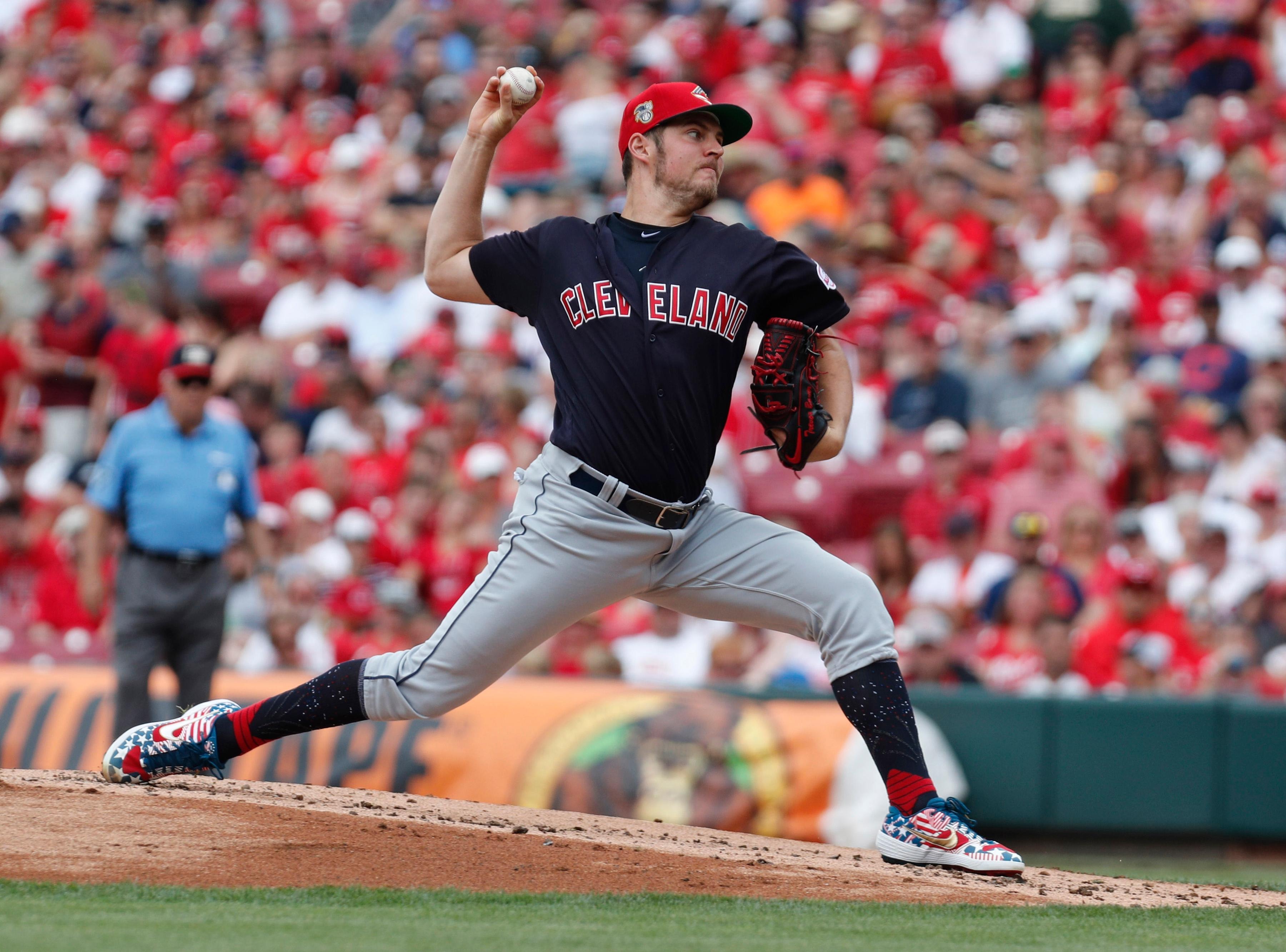 Jul 7, 2019; Cincinnati, OH, USA; Cleveland Indians starting pitcher Trevor Bauer (47) throws against the Cincinnati Reds during the first inning at Great American Ball Park. Mandatory Credit: David Kohl-USA TODAY Sports