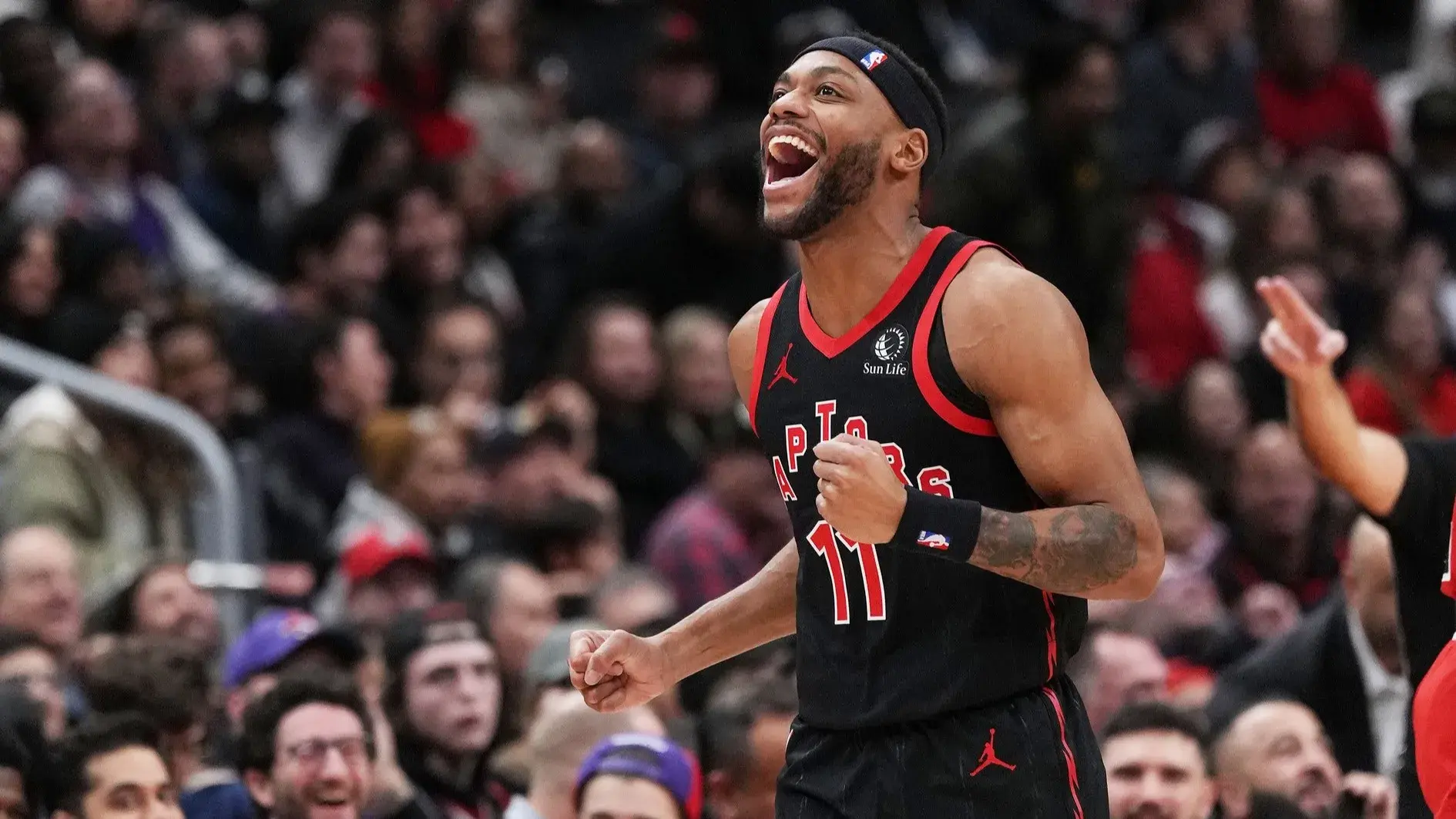 Jan 18, 2024; Toronto, Ontario, CAN; Toronto Raptors guard Bruce Brown (11) reacts against the Chicago Bulls during the third quarter at Scotiabank Arena. / Nick Turchiaro-USA TODAY Sports