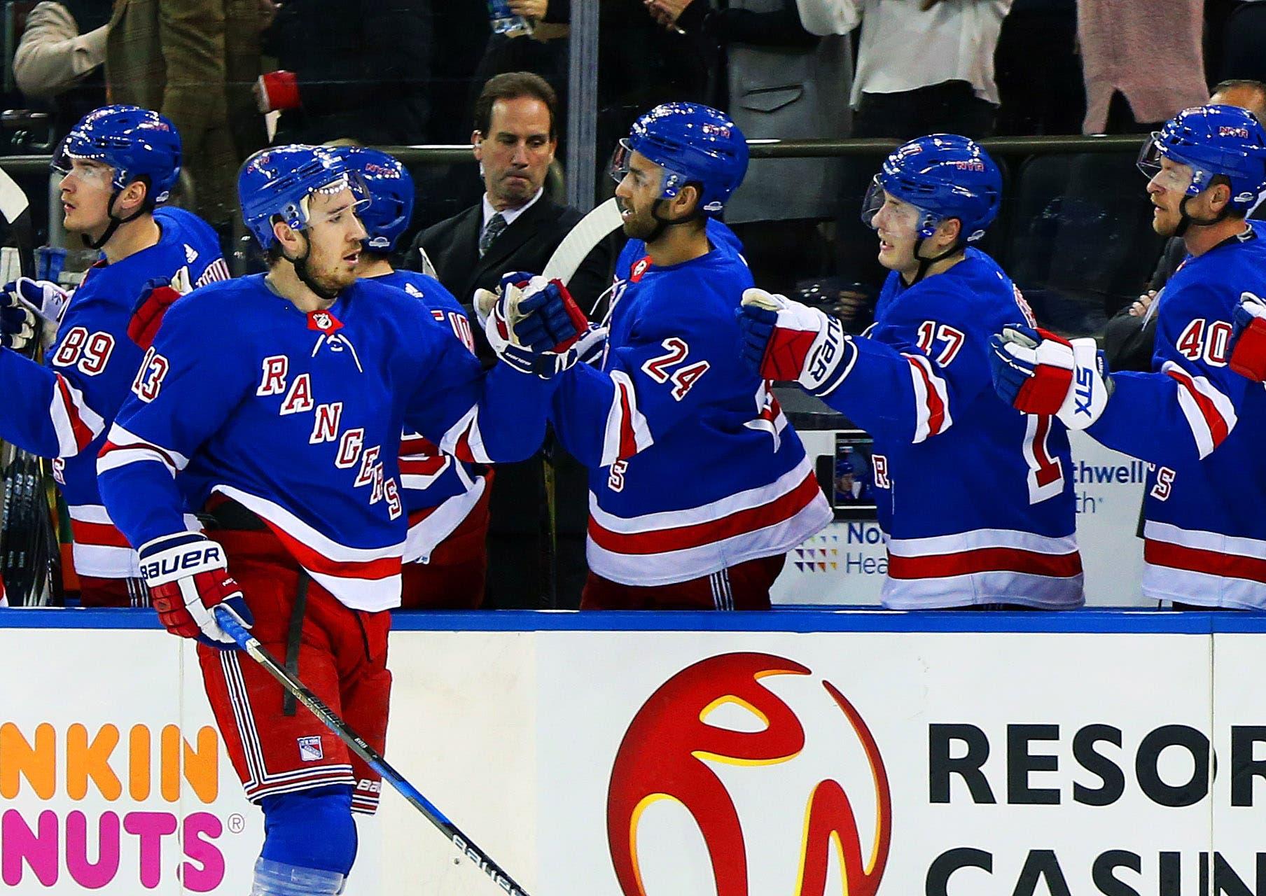 Jan 13, 2018; New York, NY, USA; New York Rangers center Kevin Hayes (13) is congratulated after scoring a goal against the New York Islanders during the first period at Madison Square Garden. Mandatory Credit: Andy Marlin-USA TODAY Sports / Andy Marlin