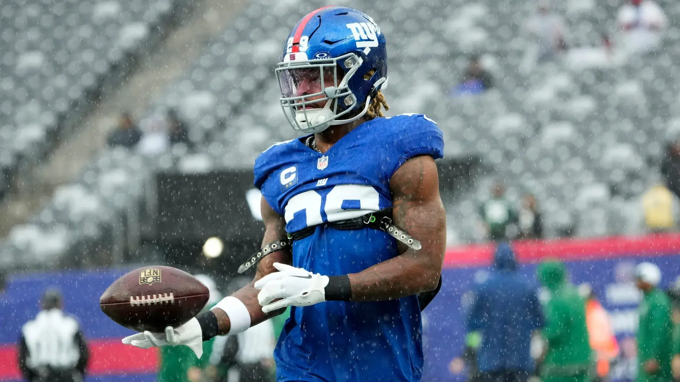 October 29, 2023; East Rutherford, NJ, USA; New York Giants safety Xavier McKinney (29) is shown with the ball during a pregame warm-up. / Kevin R. Wexler - The Record / USA TODAY NETWORK