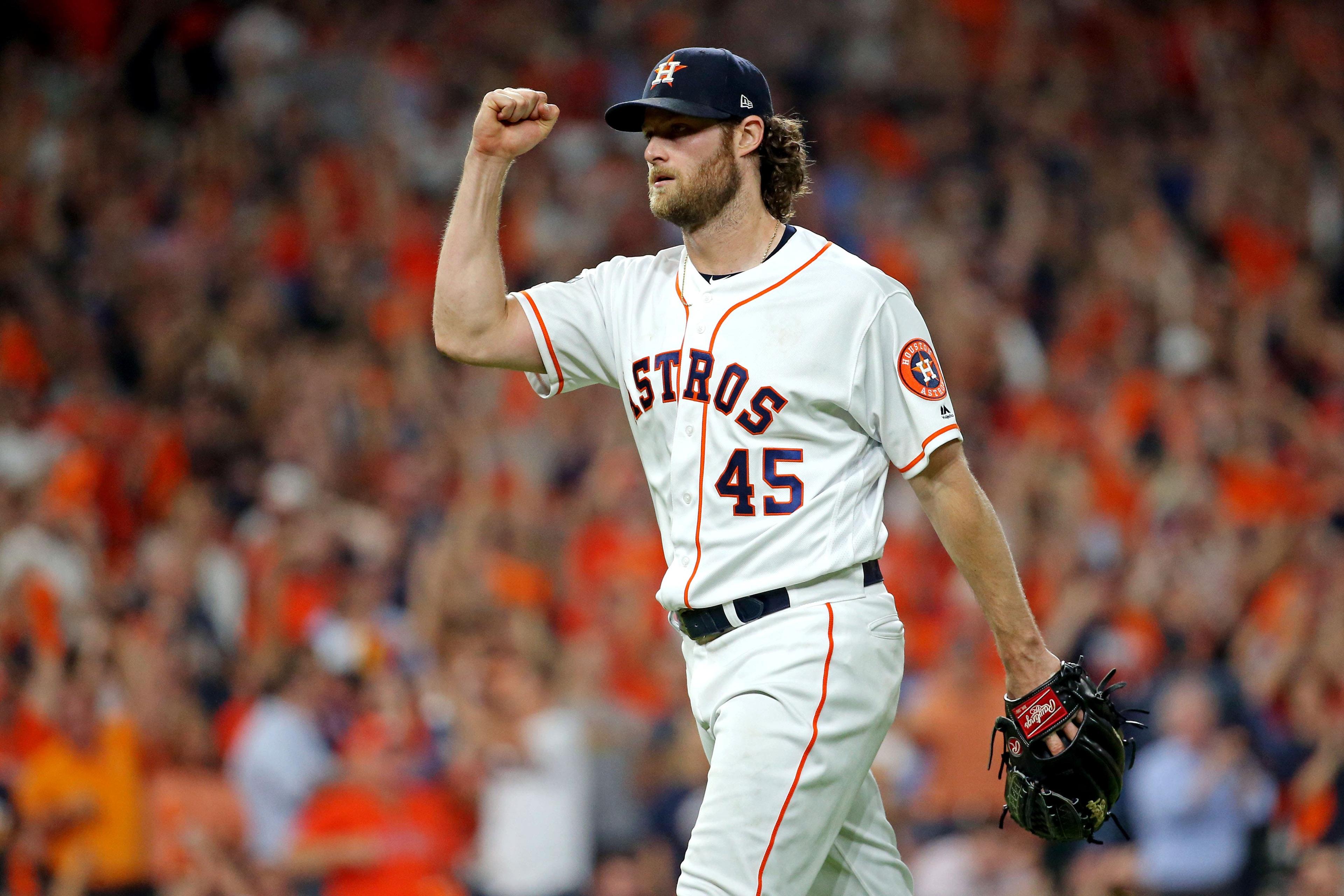 Oct 10, 2019; Houston, TX, USA; Houston Astros starting pitcher Gerrit Cole (45) reacts after a double play during the seventh inning against the Tampa Bay Rays in game five of the 2019 ALDS playoff baseball series at Minute Maid Park. Mandatory Credit: Troy Taormina-USA TODAY Sports / Troy Taormina