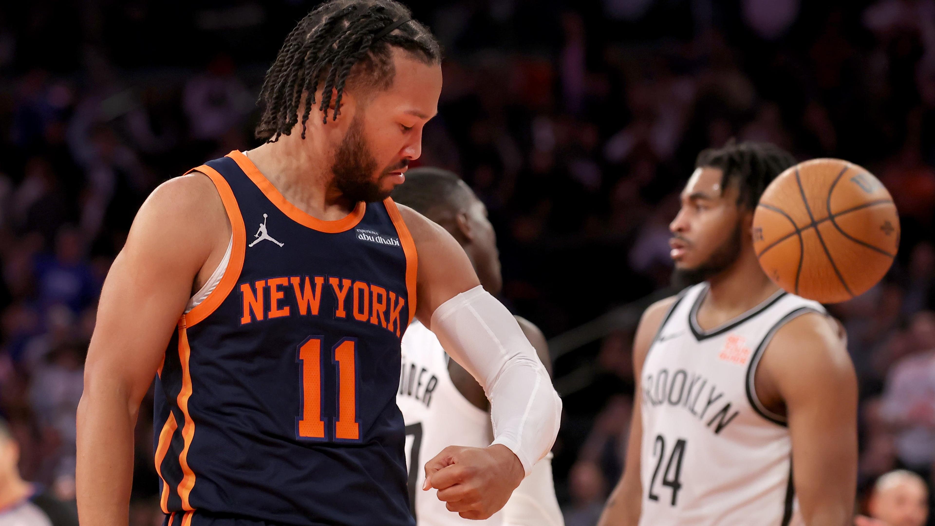 New York Knicks guard Jalen Brunson (11) flexes after a basket and a foul against the Brooklyn Nets during the fourth quarter at Madison Square Garden / Brad Penner - Imagn Images