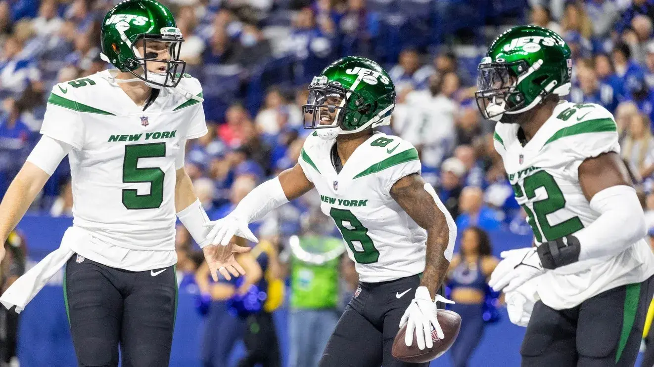 Nov 4, 2021; Indianapolis, Indiana, USA; New York Jets wide receiver Elijah Moore (8) celebrates a touchdown with quarterback Mike White (5) in the first quarter against the Indianapolis Colts at Lucas Oil Stadium. / Trevor Ruszkowski-USA TODAY Sports