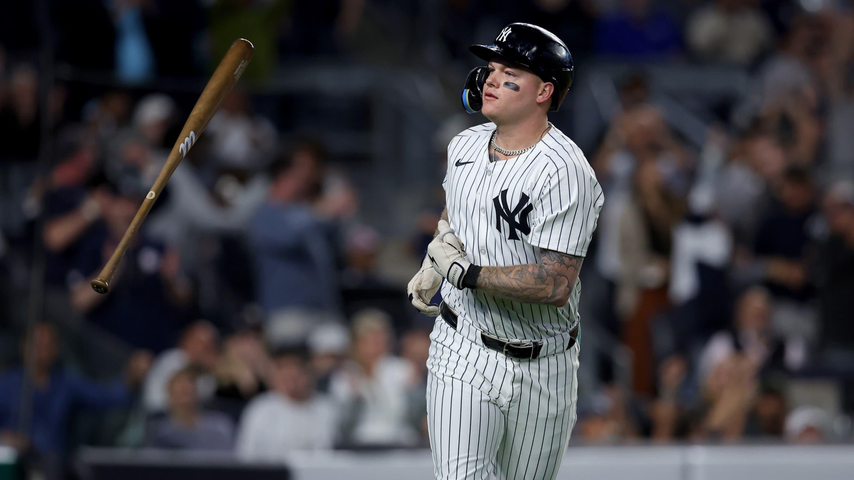 Sep 9, 2024; Bronx, New York, USA; New York Yankees left fielder Alex Verdugo (24) flips his bat after hitting a two run home run against the Kansas City Royals during the fourth inning at Yankee Stadium. / Brad Penner-Imagn Images