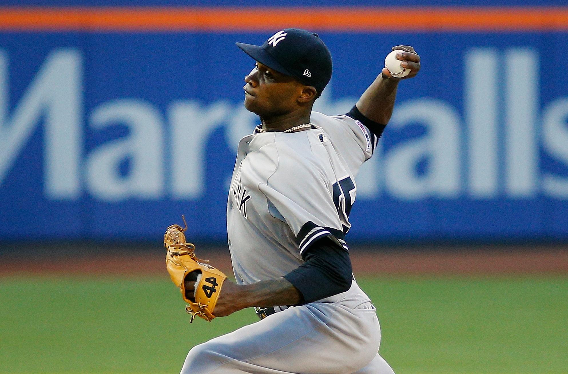 New York Yankees starting pitcher Domingo German pitches against the New York Mets during the first inning at Citi Field.