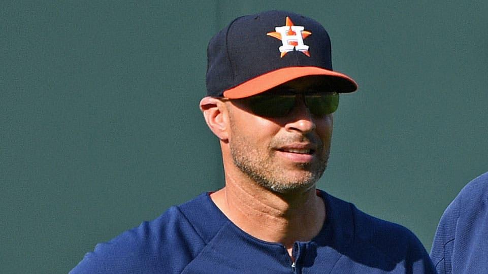 Jun 15, 2018; Kansas City, MO, USA; Houston Astros manager AJ Hinch (14) and bench coach Joe Espada (20) look on during batting practice, prior to a game against the Kansas City Royals at Kauffman Stadium. / Peter G. Aiken/USA TODAY Sports