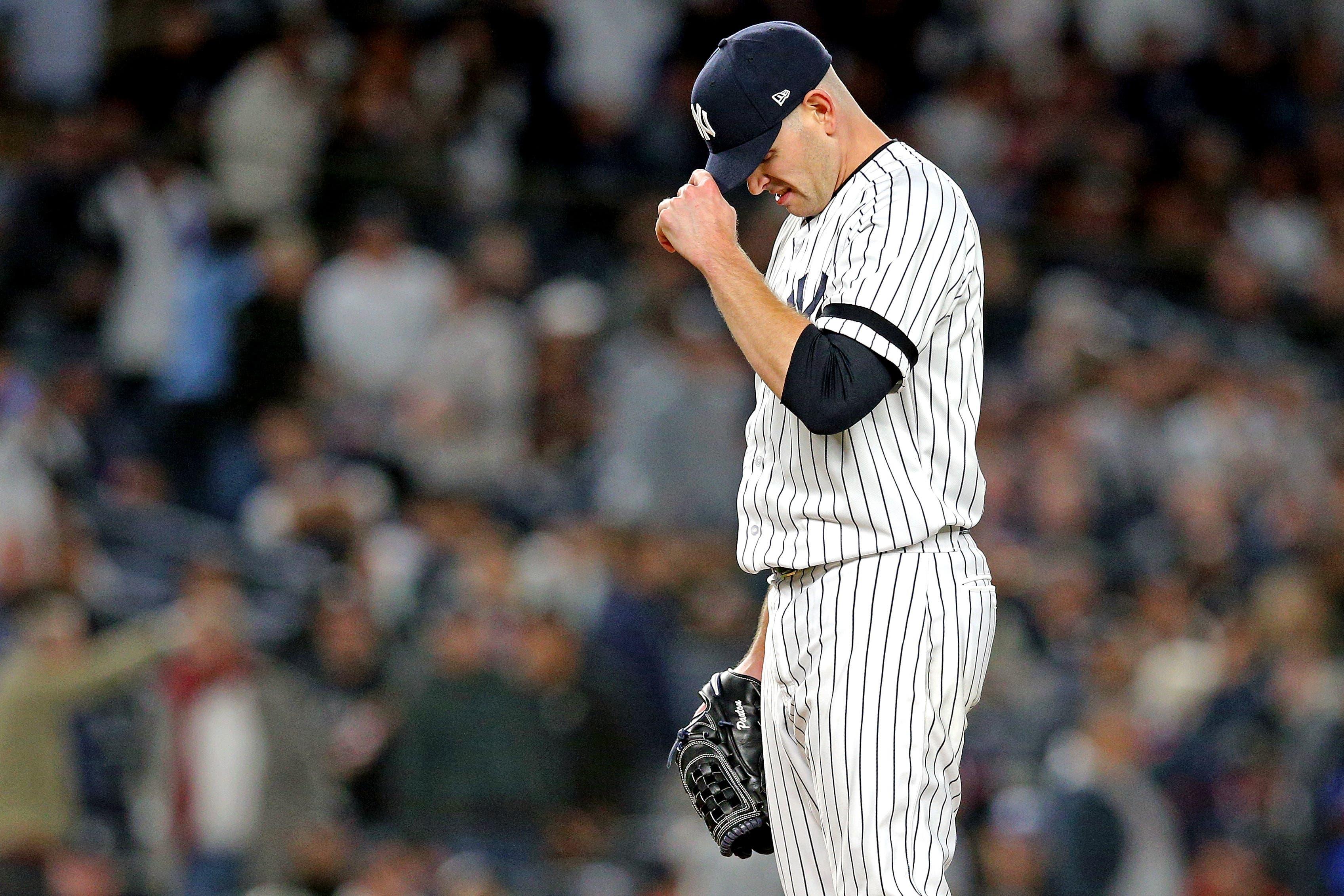 Oct 4, 2019; Bronx, NY, USA; New York Yankees starting pitcher James Paxton (65) reacts after giving up a home run to Minnesota Twins shortstop Jorge Polanco (not pictured( during the first inning in game one of the 2019 ALDS playoff baseball series at Yankee Stadium. Mandatory Credit: Brad Penner-USA TODAY Sports / Brad Penner