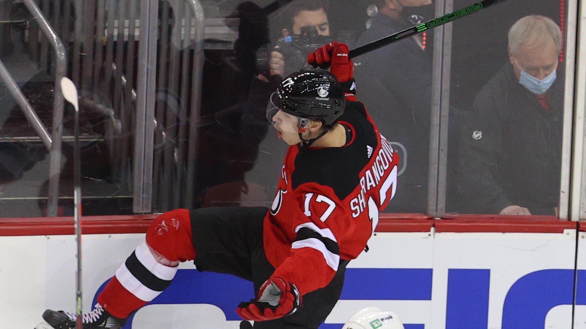 Jan 16, 2021; Newark, New Jersey, USA; New Jersey Devils left wing Yegor Sharangovich (17) celebrates his game winning goal during overtime of their game against the Boston Bruins at Prudential Center. Mandatory Credit: Ed Mulholland-USA TODAY Sports / Ed Mulholland-USA TODAY Sports