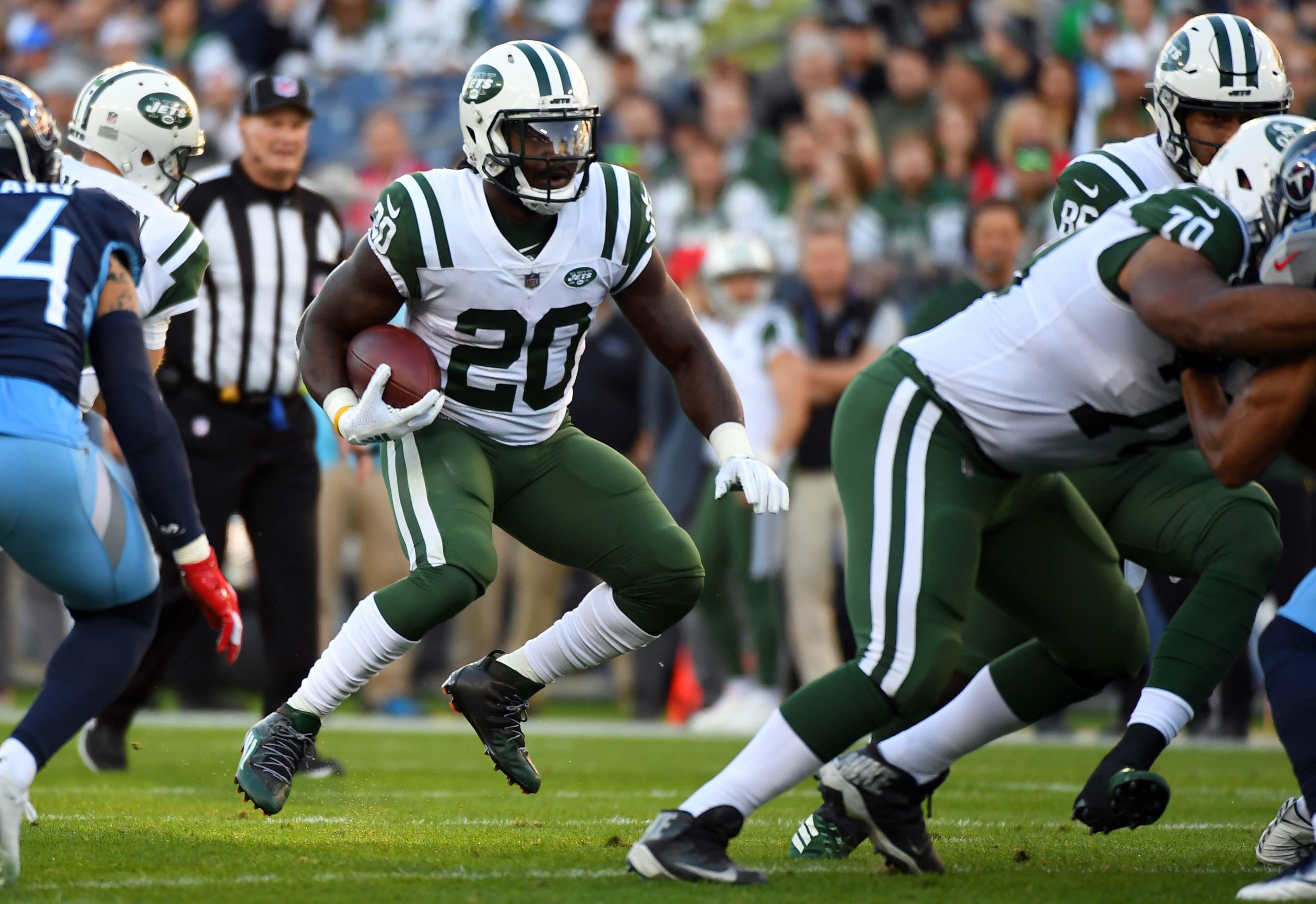 New York Jets running back Isaiah Crowell looks for a hole to run through during the first half against the Tennessee Titans at Nissan Stadium. / Christopher Hanewinckel/USA TODAY Sports