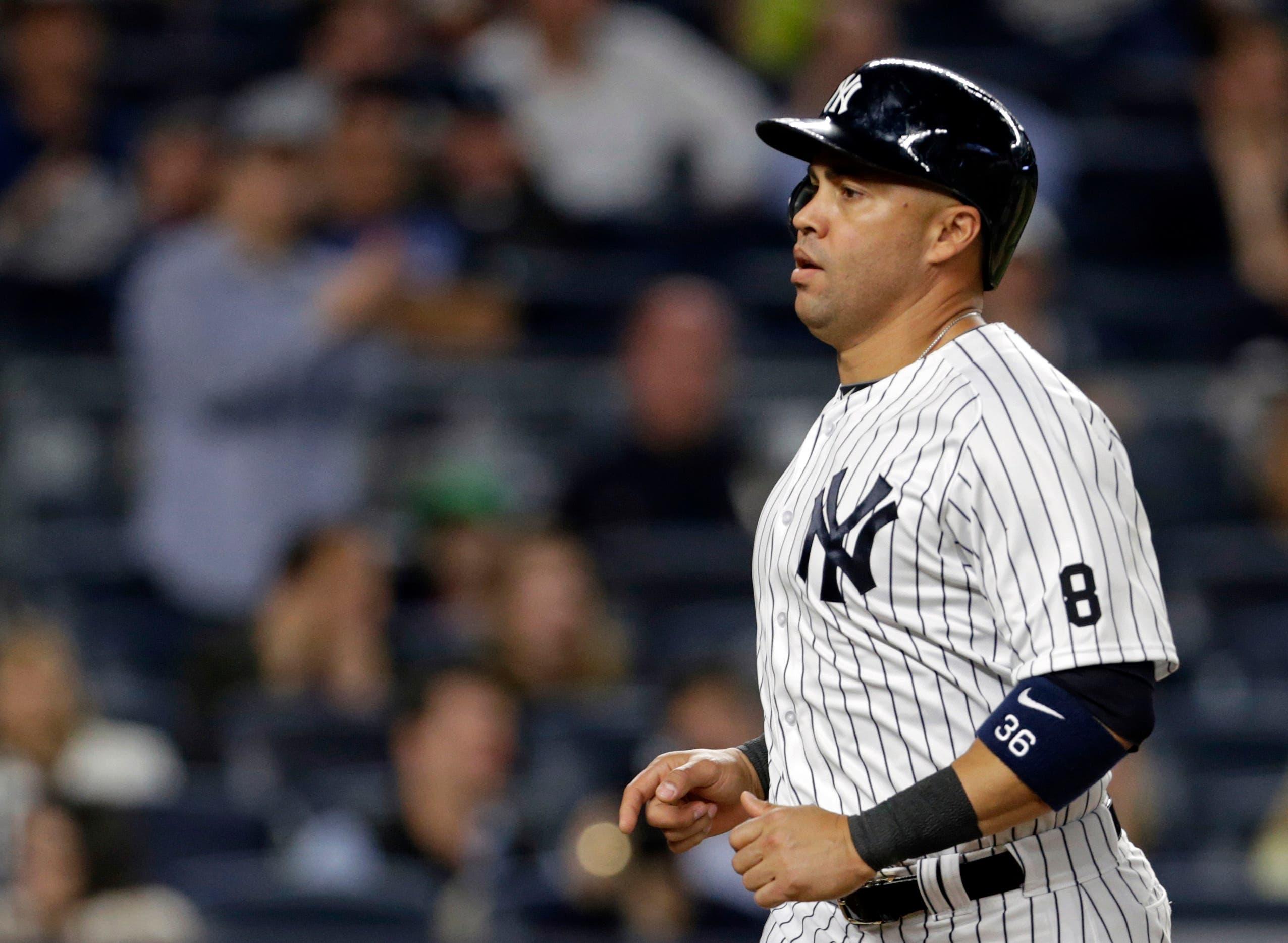 New York Yankees right fielder Carlos Beltran scores a run against the Toronto Blue Jays during the eighth inning at Yankee Stadium. / Adam Hunger/USA TODAY Sports