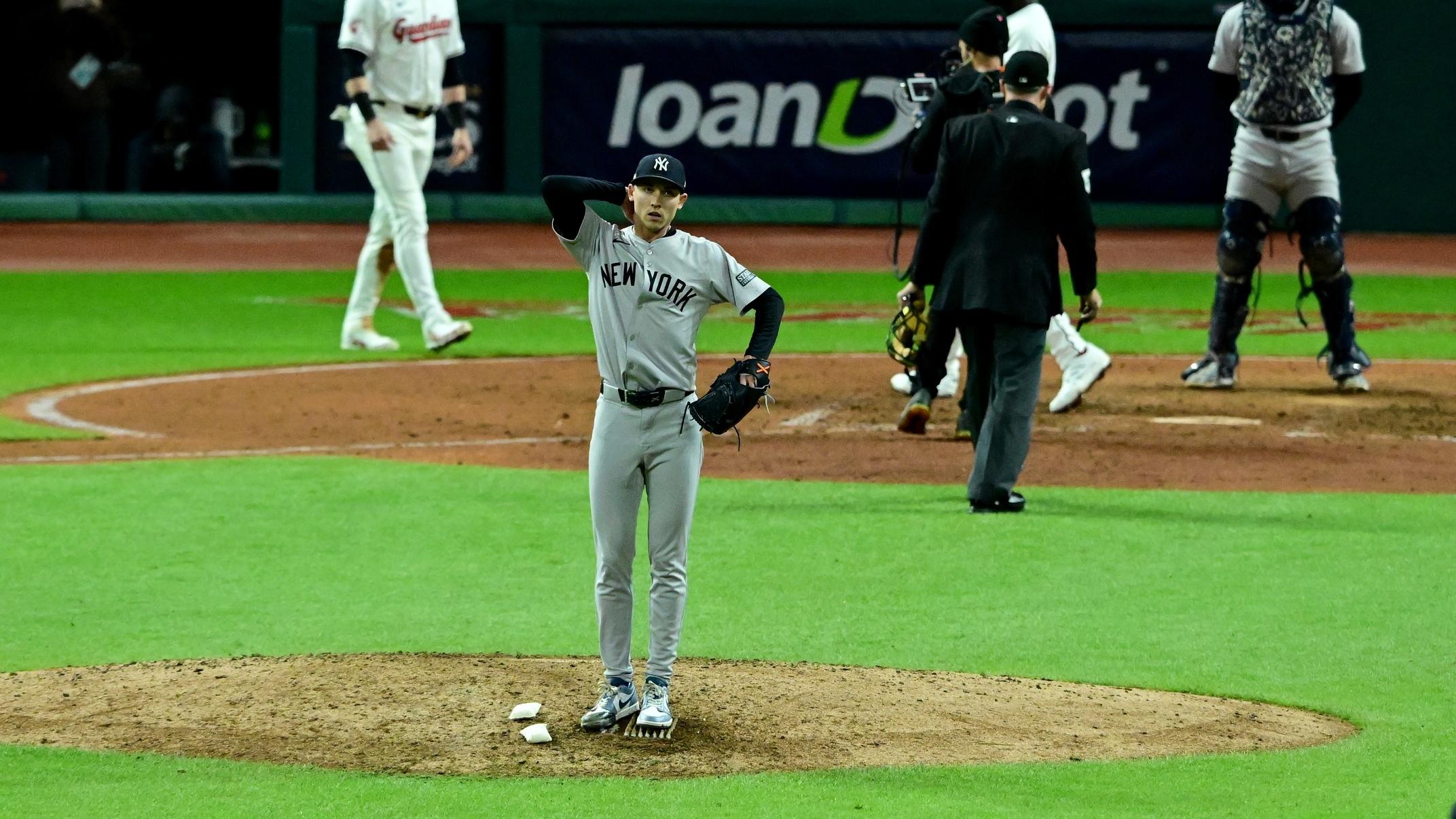 Oct 17, 2024; Cleveland, Ohio, USA; New York Yankees pitcher Luke Weaver (30) reacts after giving up a two-run home run during the ninth inning against the Cleveland Guardians in game 3 of the American League Championship Series at Progressive Field. 