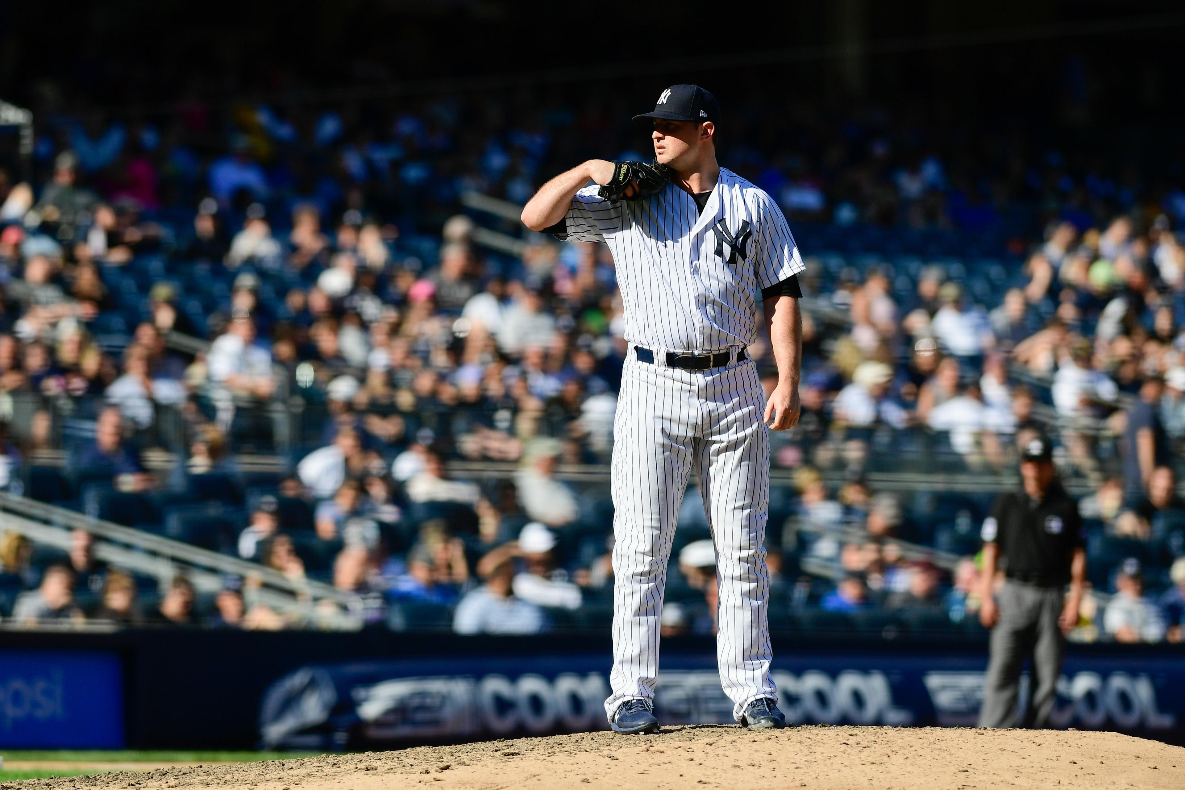 Sep 16, 2018; Bronx, NY, USA; New York Yankees pitcher Zach Britton (53) pitches against the Toronto Blue Jays during the ninth inning at Yankee Stadium. Mandatory Credit: Catalina Fragoso-USA TODAY Sports