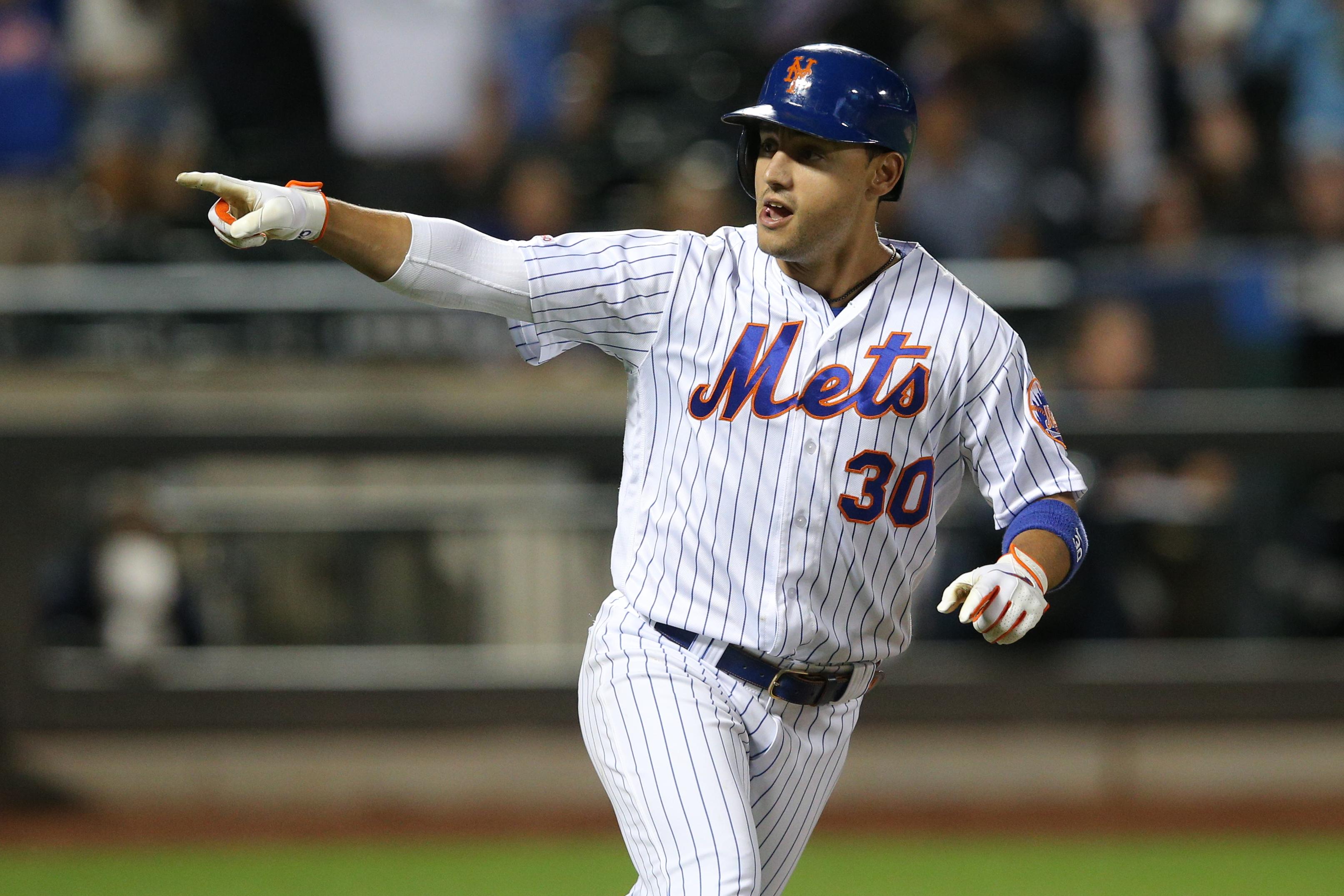 Mets fight off elimination with extra-inning win over Marlins; 'We're going to keep fighting'