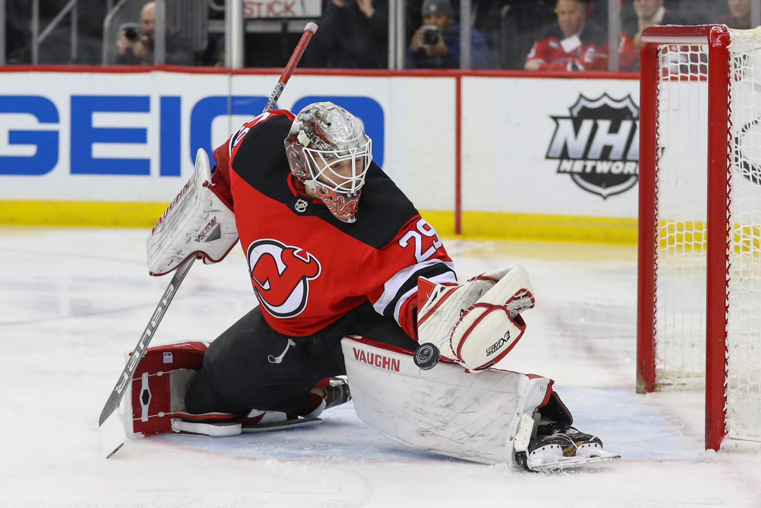 Jan 14, 2019; Newark, NJ, USA; New Jersey Devils goaltender Mackenzie Blackwood (29) makes a save during the first period of their game against the Chicago Blackhawks at Prudential Center. Mandatory Credit: Ed Mulholland-USA TODAY Sports / Ed Mulholland