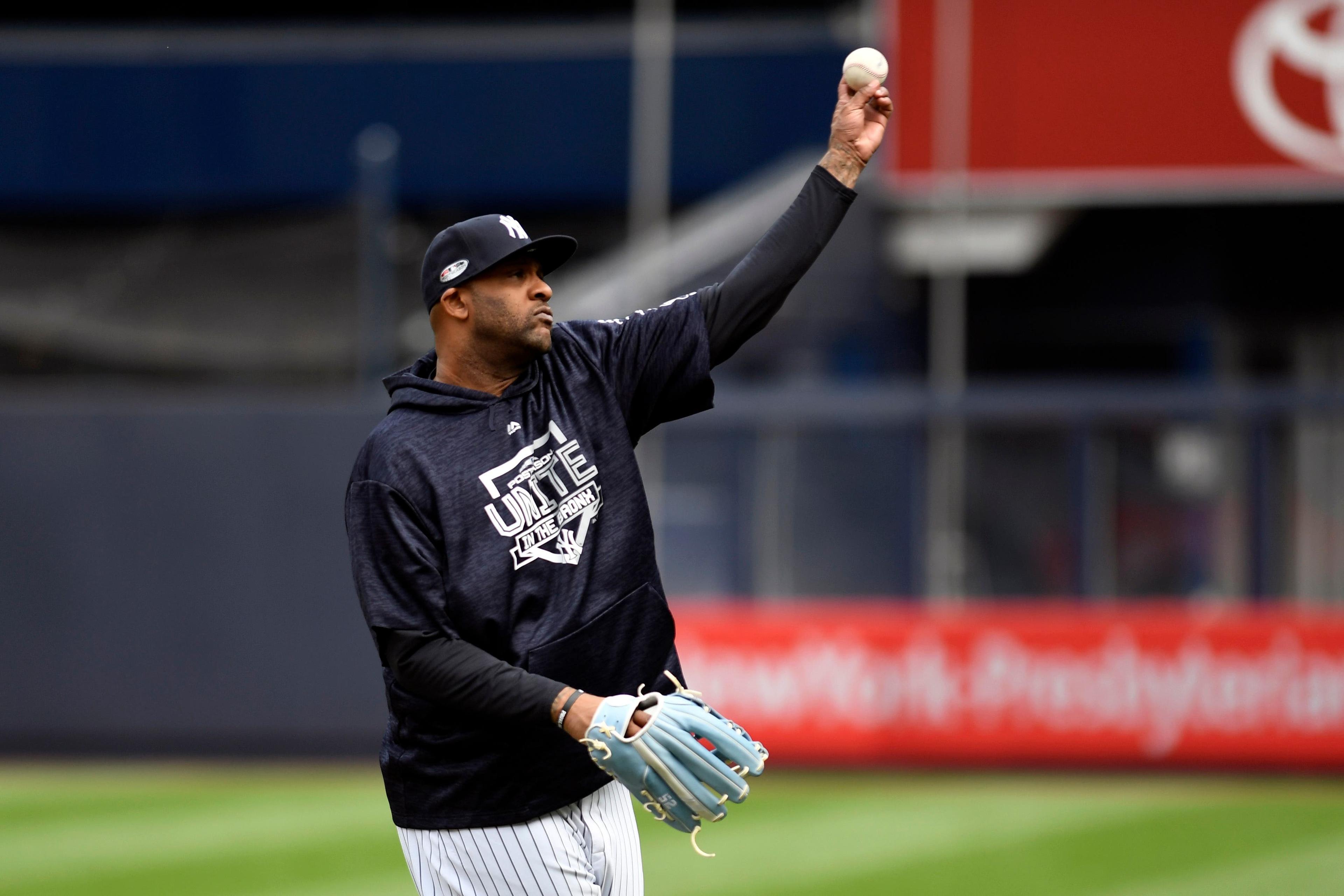 New York Yankees pitcher CC Sabathia throws the ball during workouts one day before the 2018 American League wild-card game at Yankee Stadium. / Danielle Parhizkaran/NorthJersey.com via USA TODAY Sports