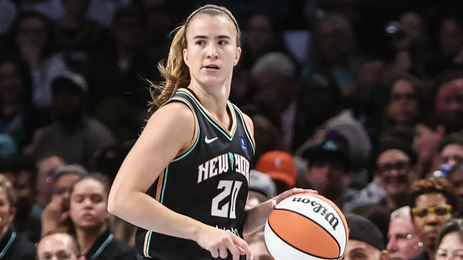 May 18, 2024; Brooklyn, New York, USA; New York Liberty guard Sabrina Ionescu (20) brings the ball up court in the fourth quarter against the Indiana Fever at Barclays Center. / Wendell Cruz-USA TODAY Sports