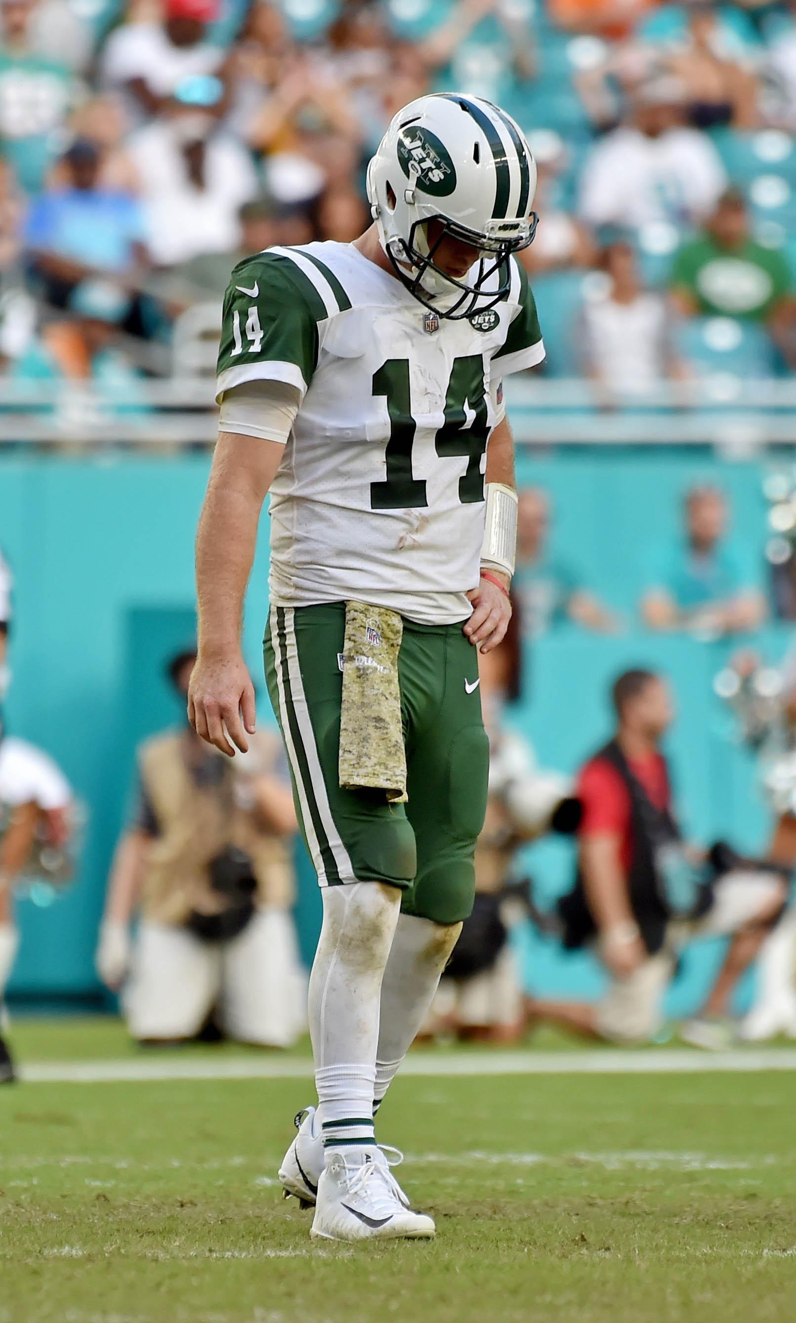 New York Jets quarterback Sam Darnold reacts against the Miami Dolphins during the second half at Hard Rock Stadium.