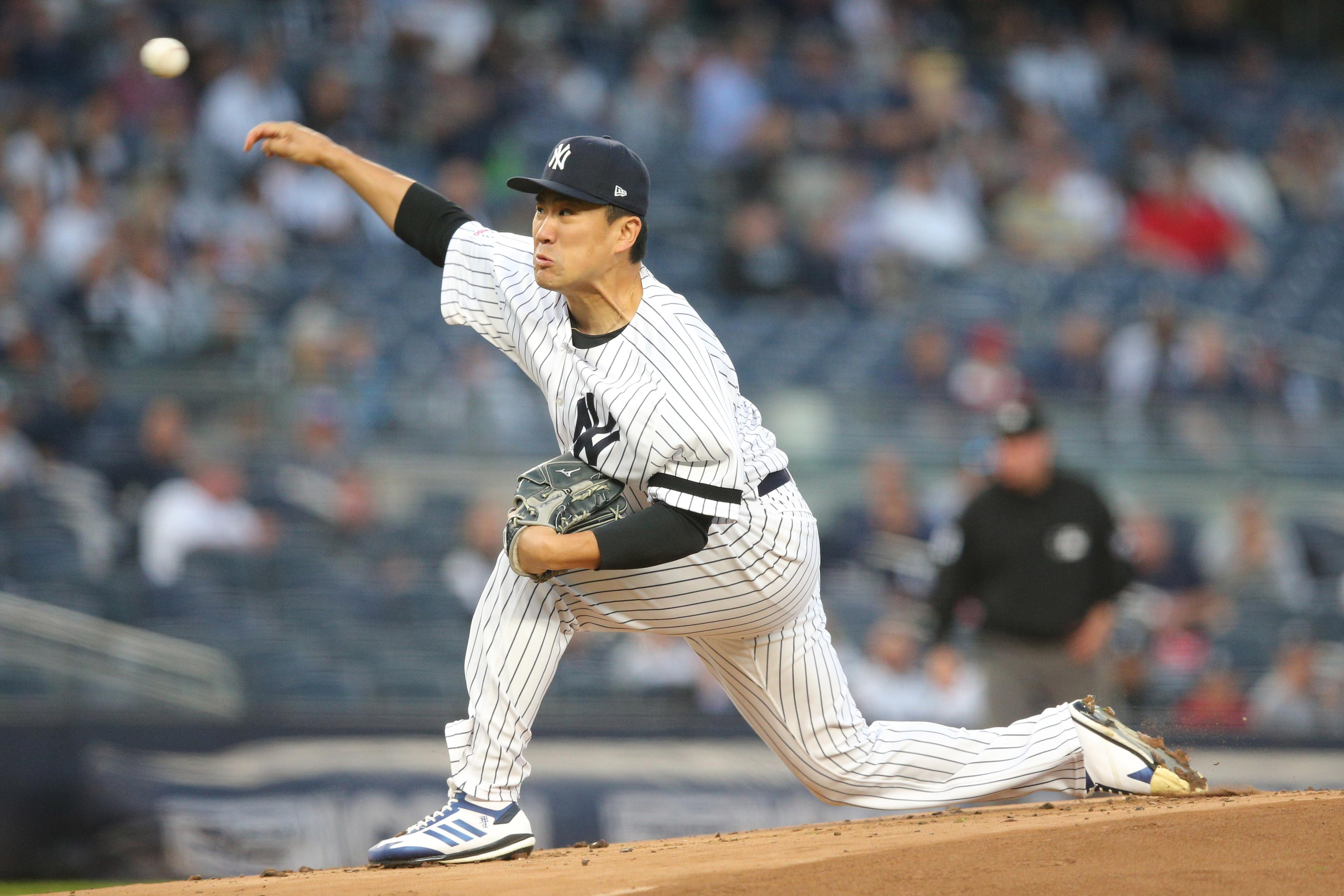 Sep 19, 2019; Bronx, NY, USA; New York Yankees starting pitcher Masahiro Tanaka (19) pitches against the Los Angeles Angels during the first inning at Yankee Stadium. Mandatory Credit: Brad Penner-USA TODAY Sports