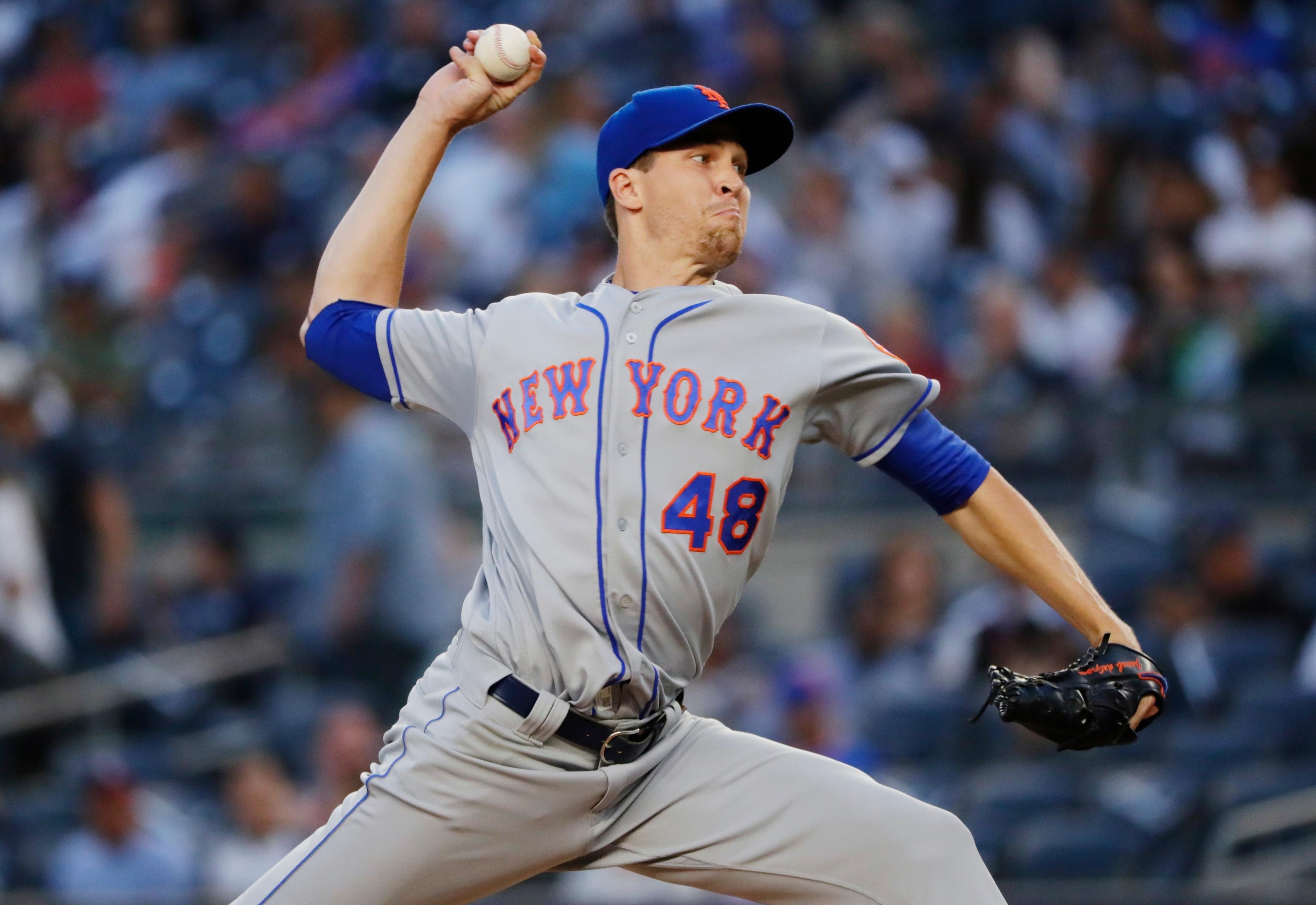 New York Mets' Jacob deGrom delivers a pitch during the first inning of a baseball game against the New York Yankees Monday, Aug. 13, 2018, in New York. (AP Photo/Frank Franklin II) / AP