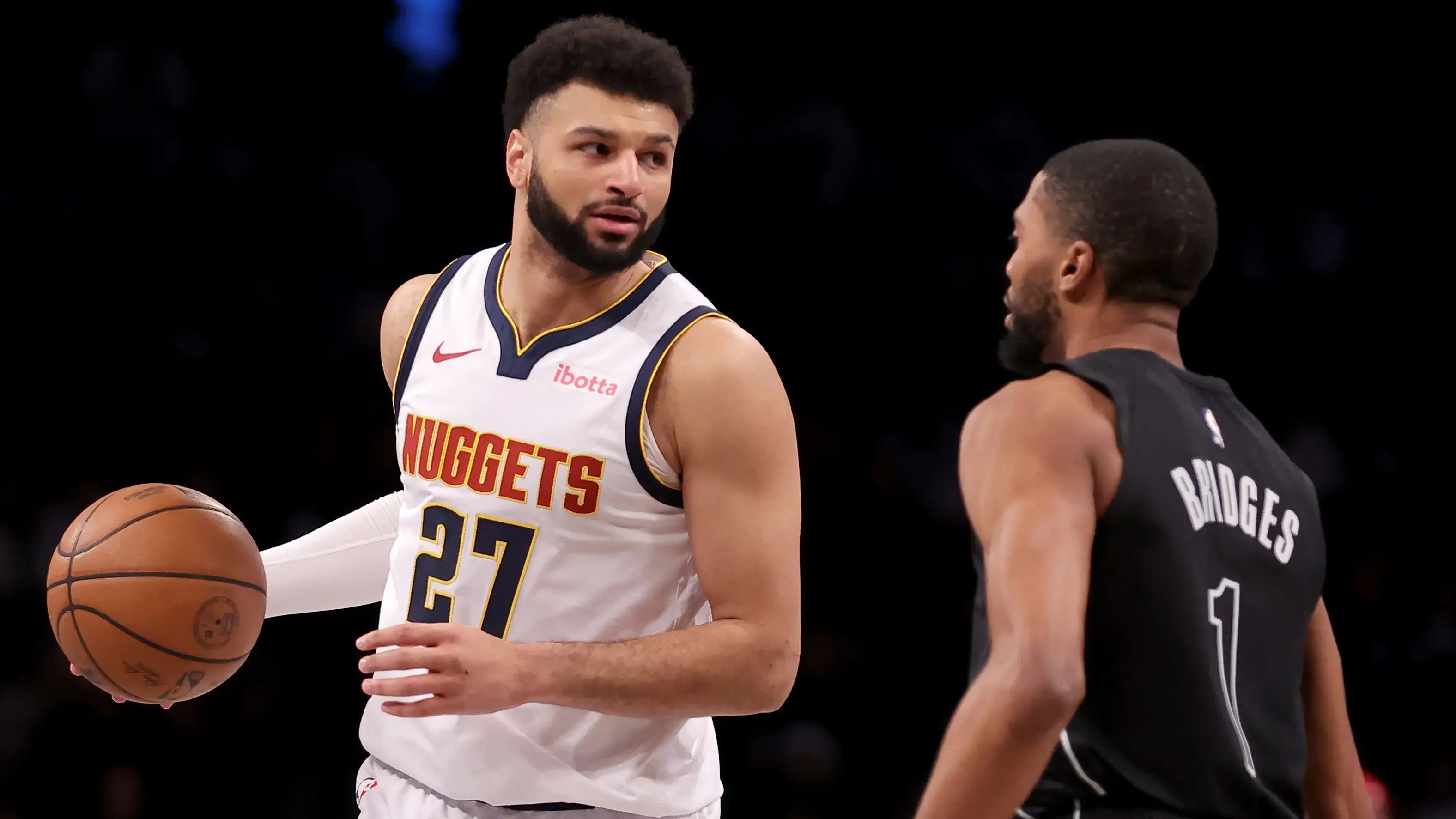 Denver Nuggets guard Jamal Murray (27) controls the ball against Brooklyn Nets forward Mikal Bridges (1) during the first quarter at Barclays Center / Brad Penner - USA TODAY Sports