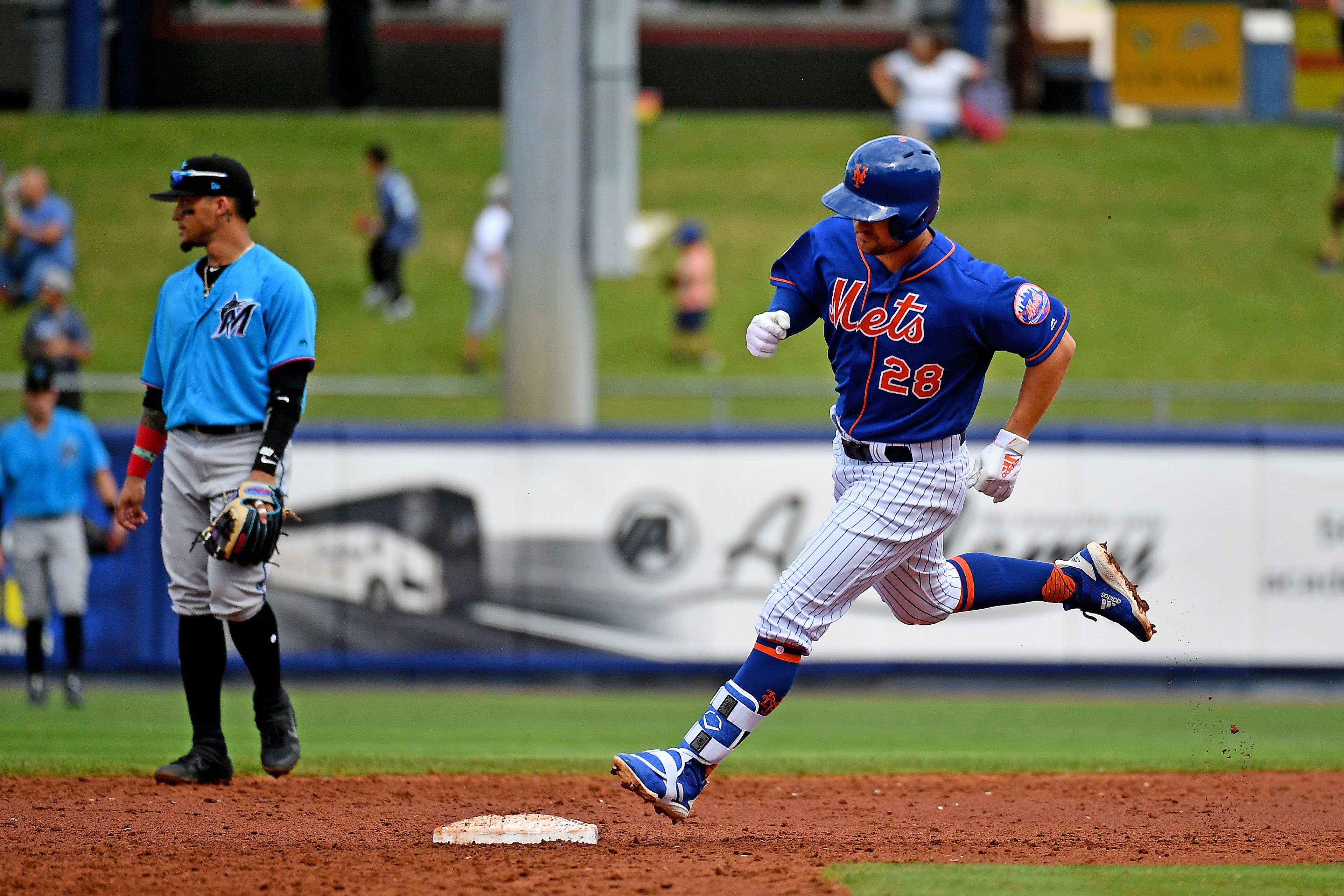 Feb 27, 2019; Port St. Lucie, FL, USA; New York Mets designated hitter J.D. Davis (28) resounds the bases after his home run in the second inning of the spring training game against the Miami Marlins at First Data Field. Mandatory Credit: Jasen Vinlove-USA TODAY Sports