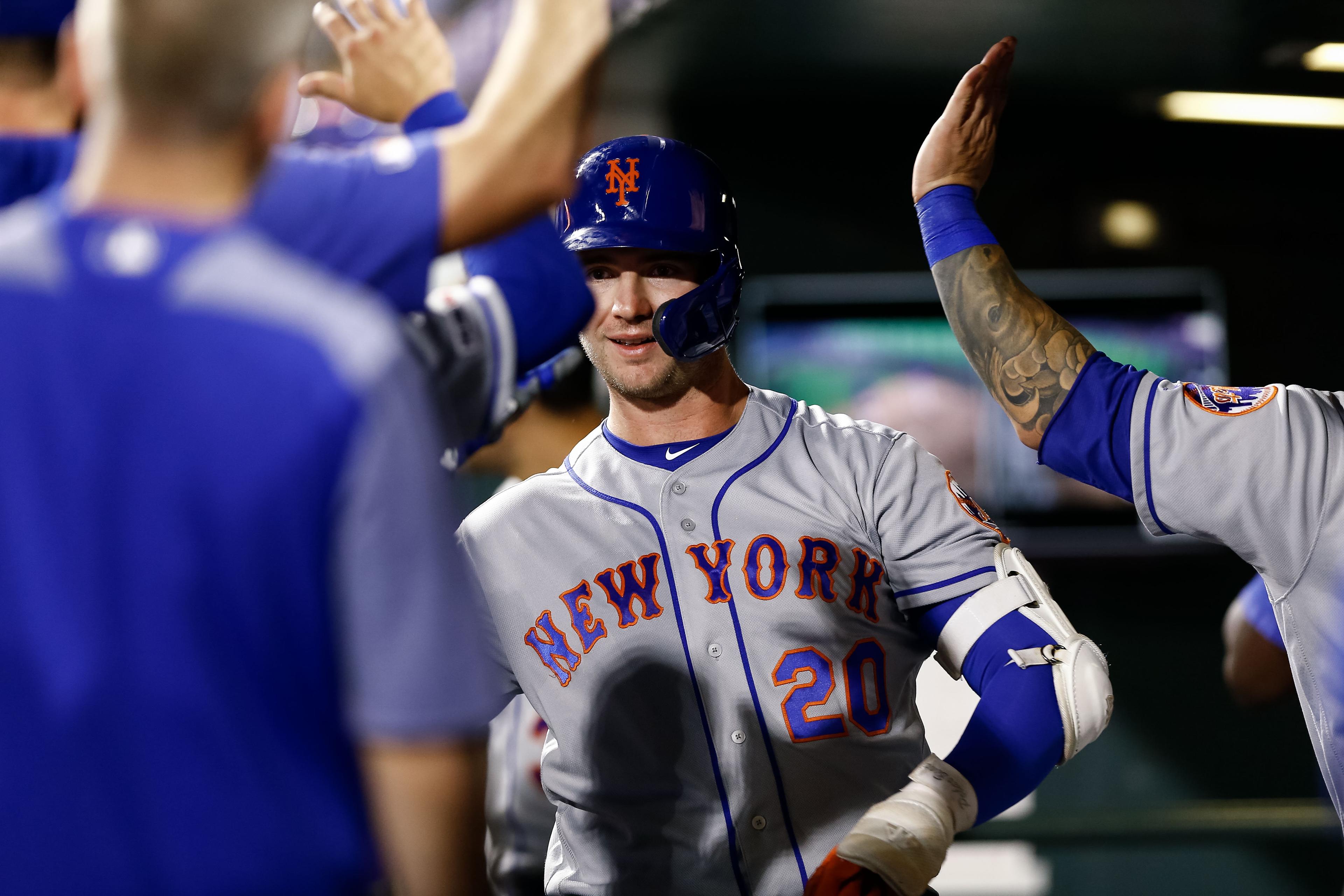 Sep 17, 2019; Denver, CO, USA; New York Mets first baseman Pete Alonso (20) celebrates in the dugout after hitting a solo home run in the sixth inning against the Colorado Rockies at Coors Field. Mandatory Credit: Isaiah J. Downing-USA TODAY Sports