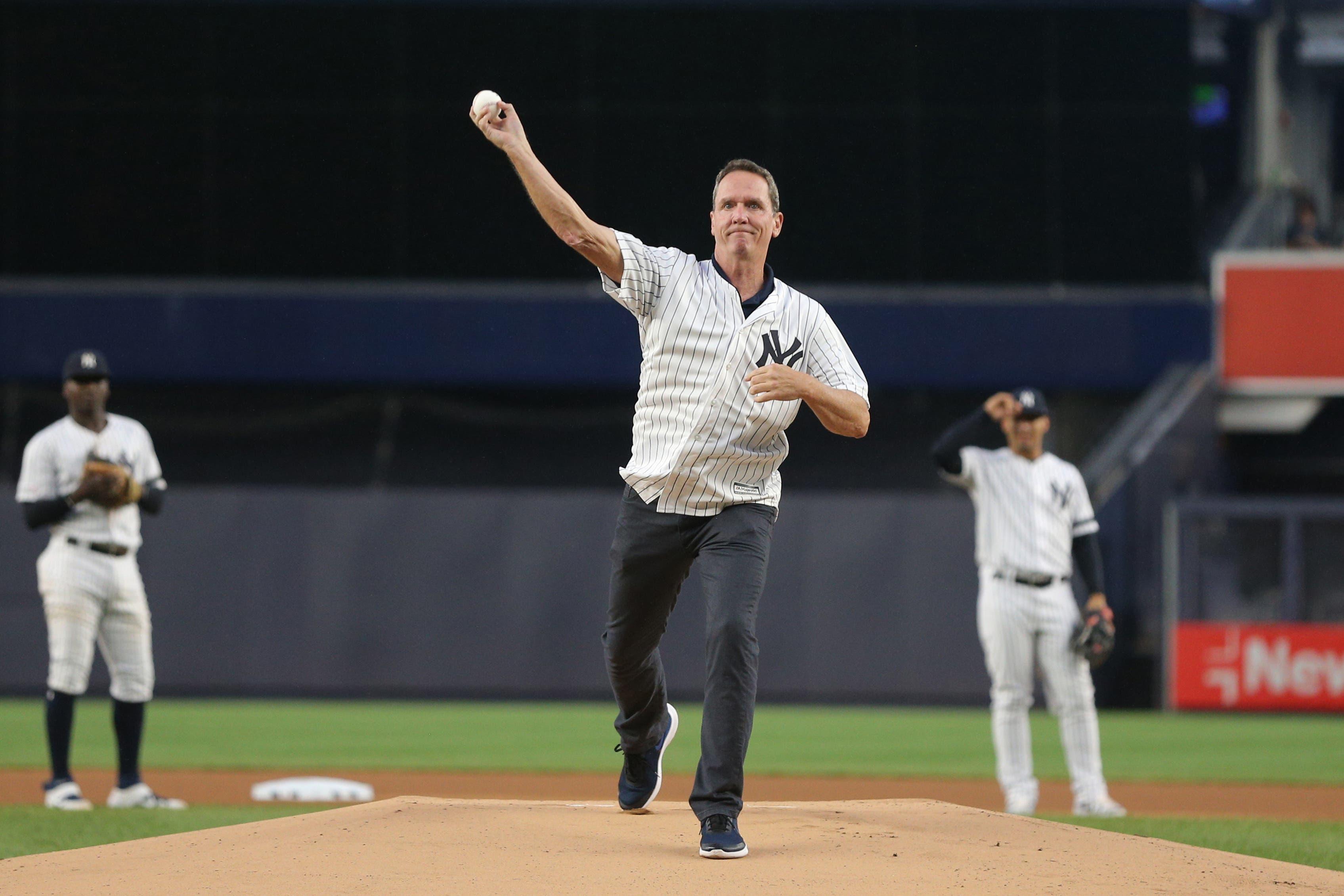 Jul 18, 2019; Bronx, NY, USA; New York Yankees former pitcher David Cone throws out the ceremonial first pitch on the twentieth anniversary of his perfect game before the second game of a doubleheader against the Tampa Bay Rays at Yankee Stadium. Mandatory Credit: Brad Penner-USA TODAY Sports / Brad Penner