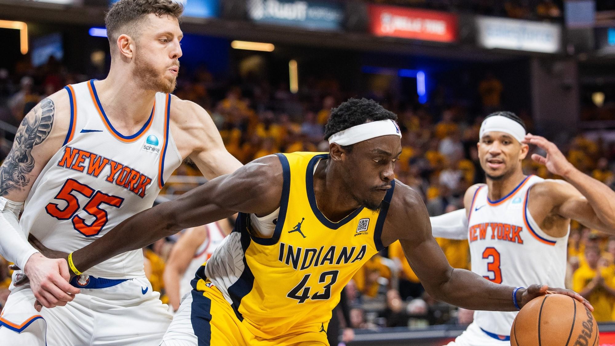 May 10, 2024; Indianapolis, Indiana, USA; Indiana Pacers forward Pascal Siakam (43) dribbles the ball while New York Knicks center Isaiah Hartenstein (55) defends during game three of the second round for the 2024 NBA playoffs at Gainbridge Fieldhouse. / Trevor Ruszkowski-USA TODAY Sports