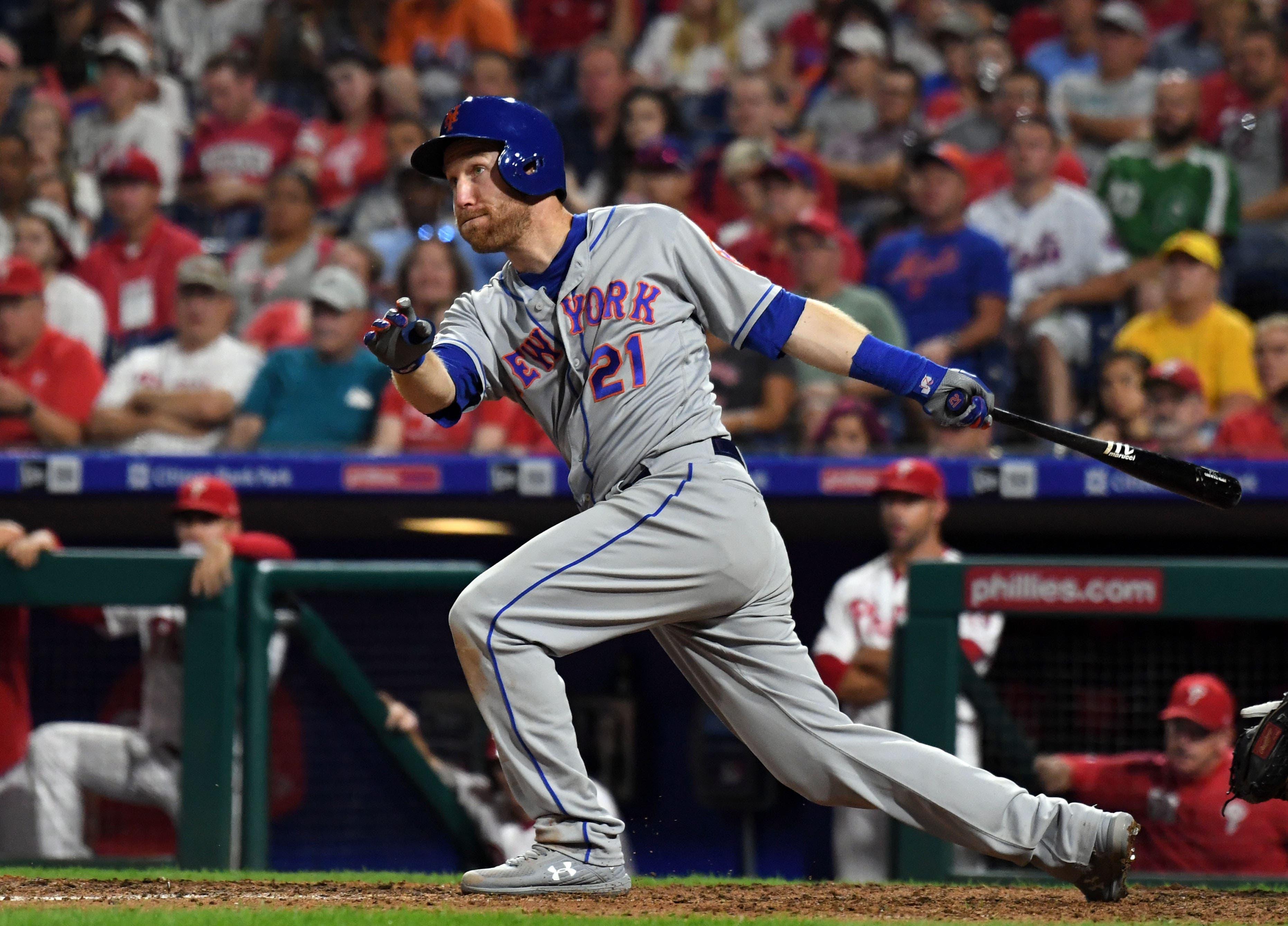 Aug 30, 2019; Philadelphia, PA, USA; New York Mets third baseman Todd Frazier (21) watches the flight of his three run home run in the eighth inning against the Philadelphia Phillies at Citizens Bank Park. Mandatory Credit: James Lang-USA TODAY Sports / James Lang