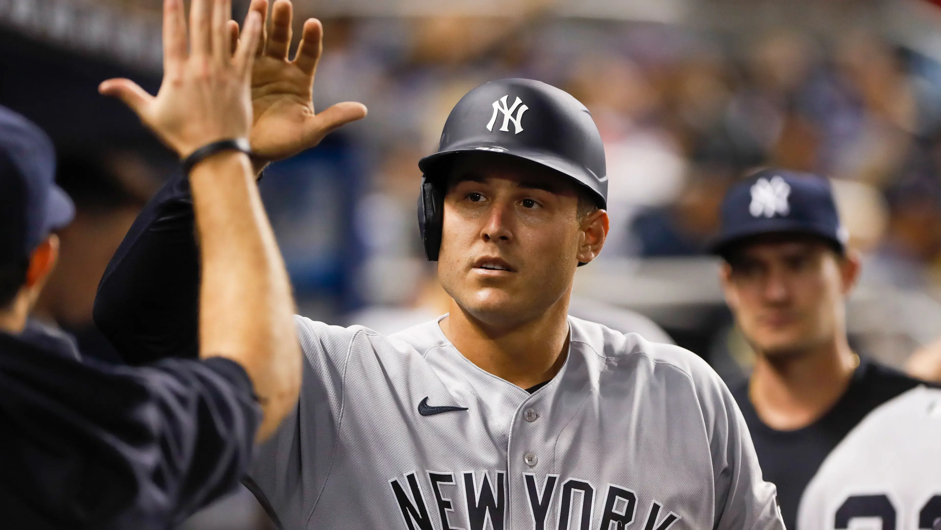 Jul 31, 2021; Miami, Florida, USA; New York Yankees first baseman Anthony Rizzo (48) celebrates with teammates after scoring during the fifth inning against the Miami Marlins at loanDepot Park. / Sam Navarro-USA TODAY Sports