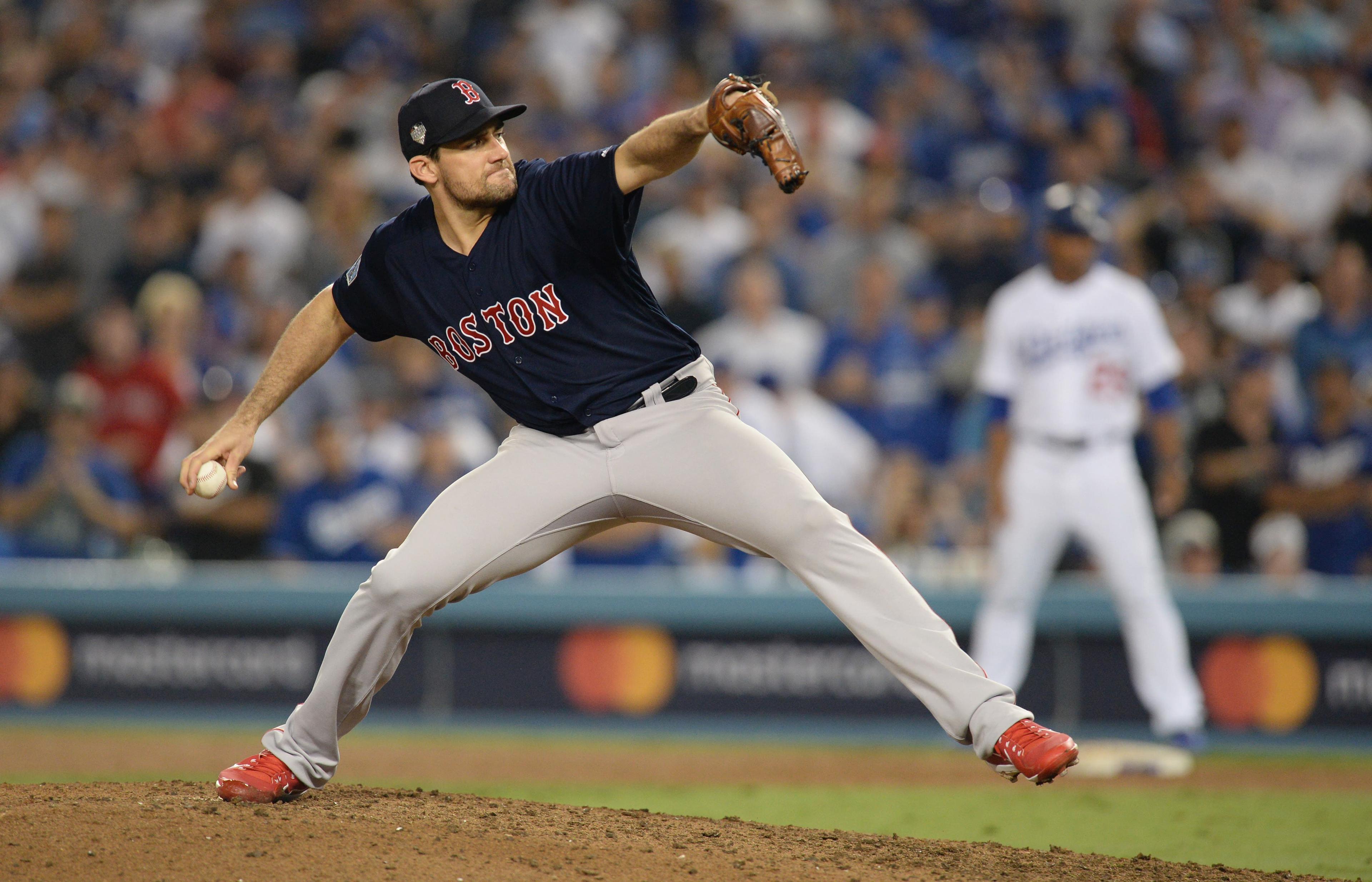 Oct 26, 2018; Los Angeles, CA, USA; Boston Red Sox pitcher Nathan Eovaldi (17) pitches in the twelfth inning against the Los Angeles Dodgers in game three of the 2018 World Series at Dodger Stadium. Mandatory Credit: Gary A. Vasquez-USA TODAY Sports / Gary A. Vasquez