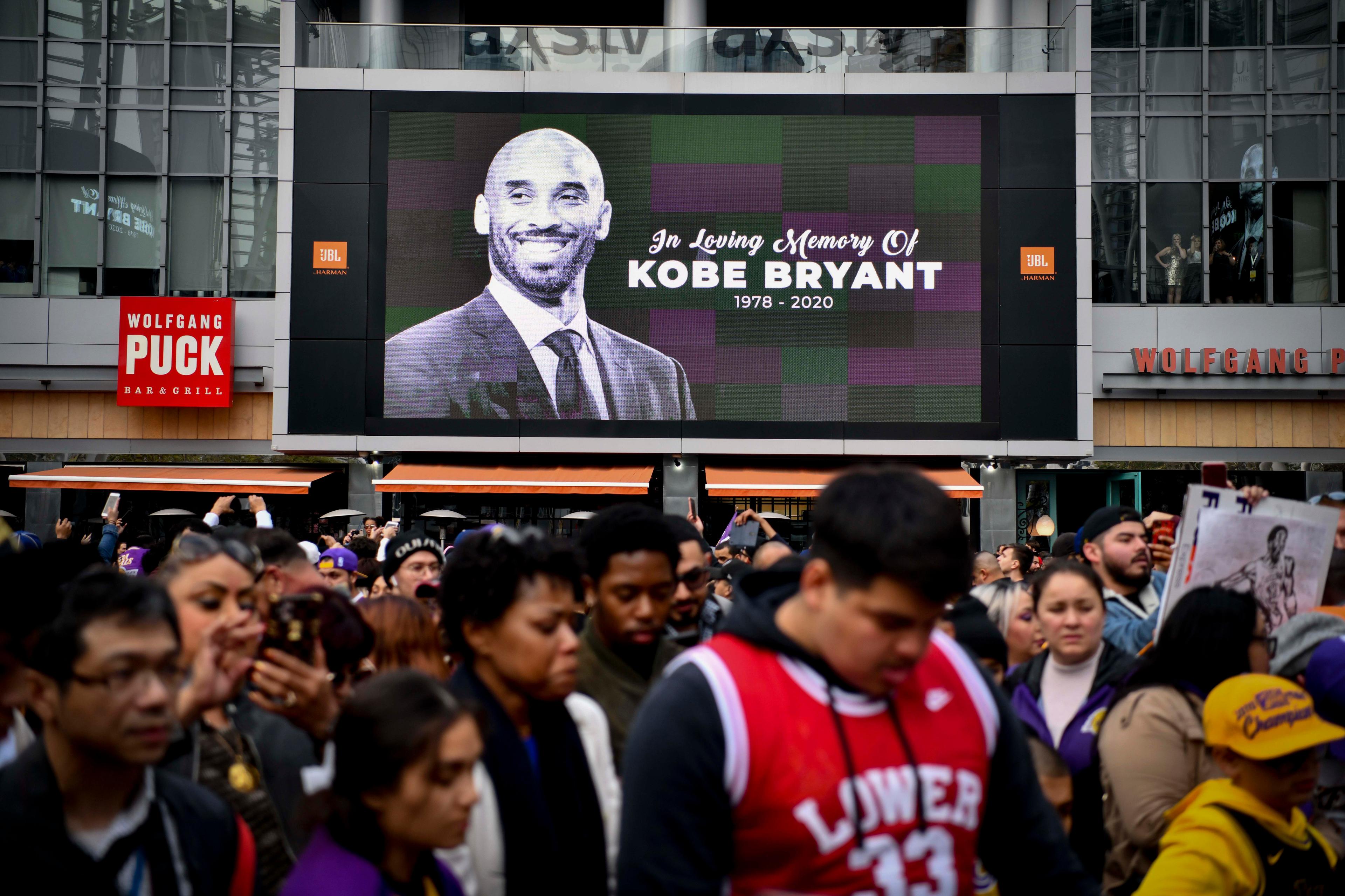 Jan 26, 2020; Los Angeles, CA, USA; Fans mourn the loss of NBA legend Kobe Bryant outside of the Staples Center in Los Angeles. Mandatory Credit: Harrison Hill-USA TODAY