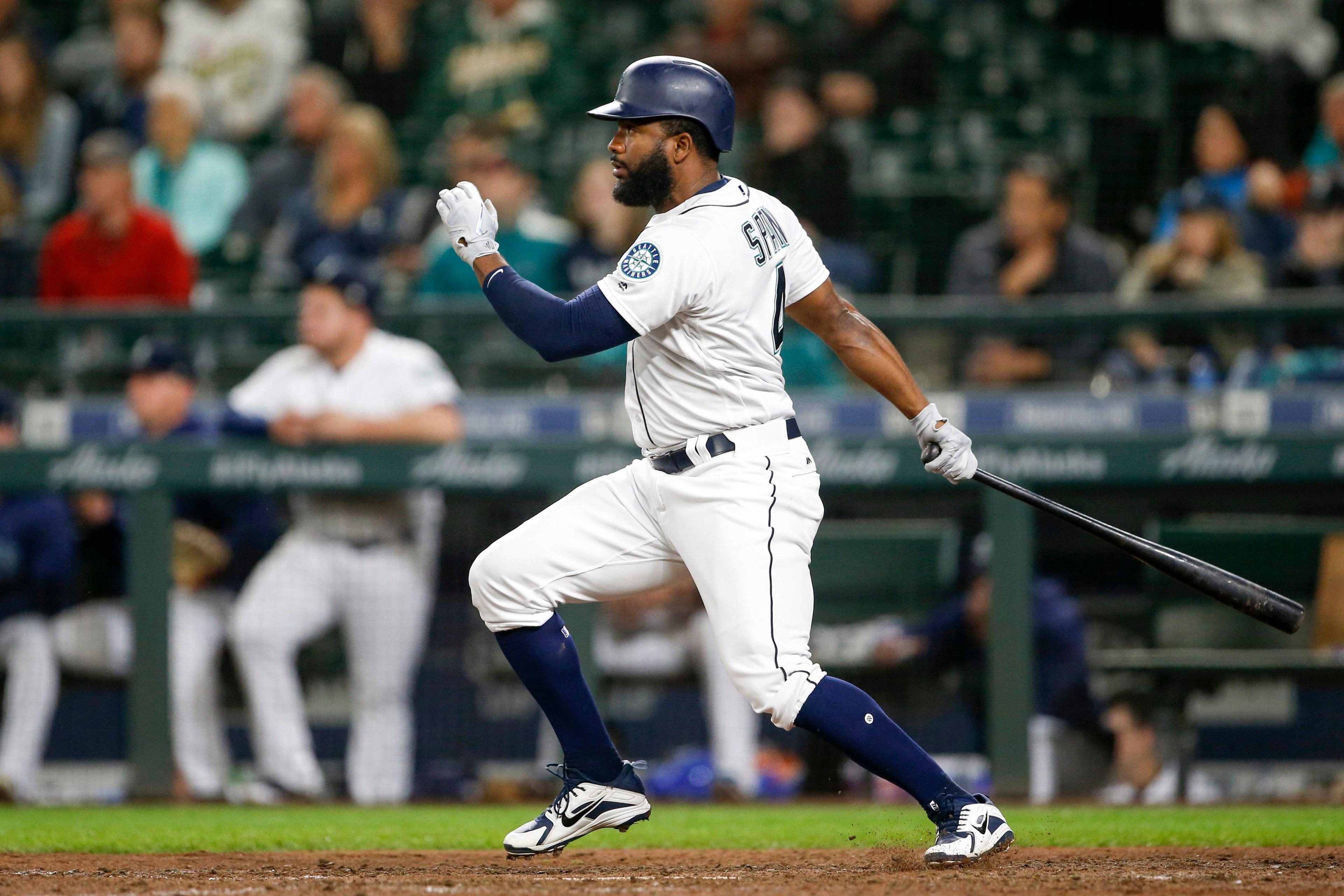 Sep 25, 2018; Seattle, WA, USA; Seattle Mariners left fielder Denard Span (4) hits a two-run double against the Oakland Athletics during the eighth inning at Safeco Field. Mandatory Credit: Joe Nicholson-USA TODAY Sports / Joe Nicholson