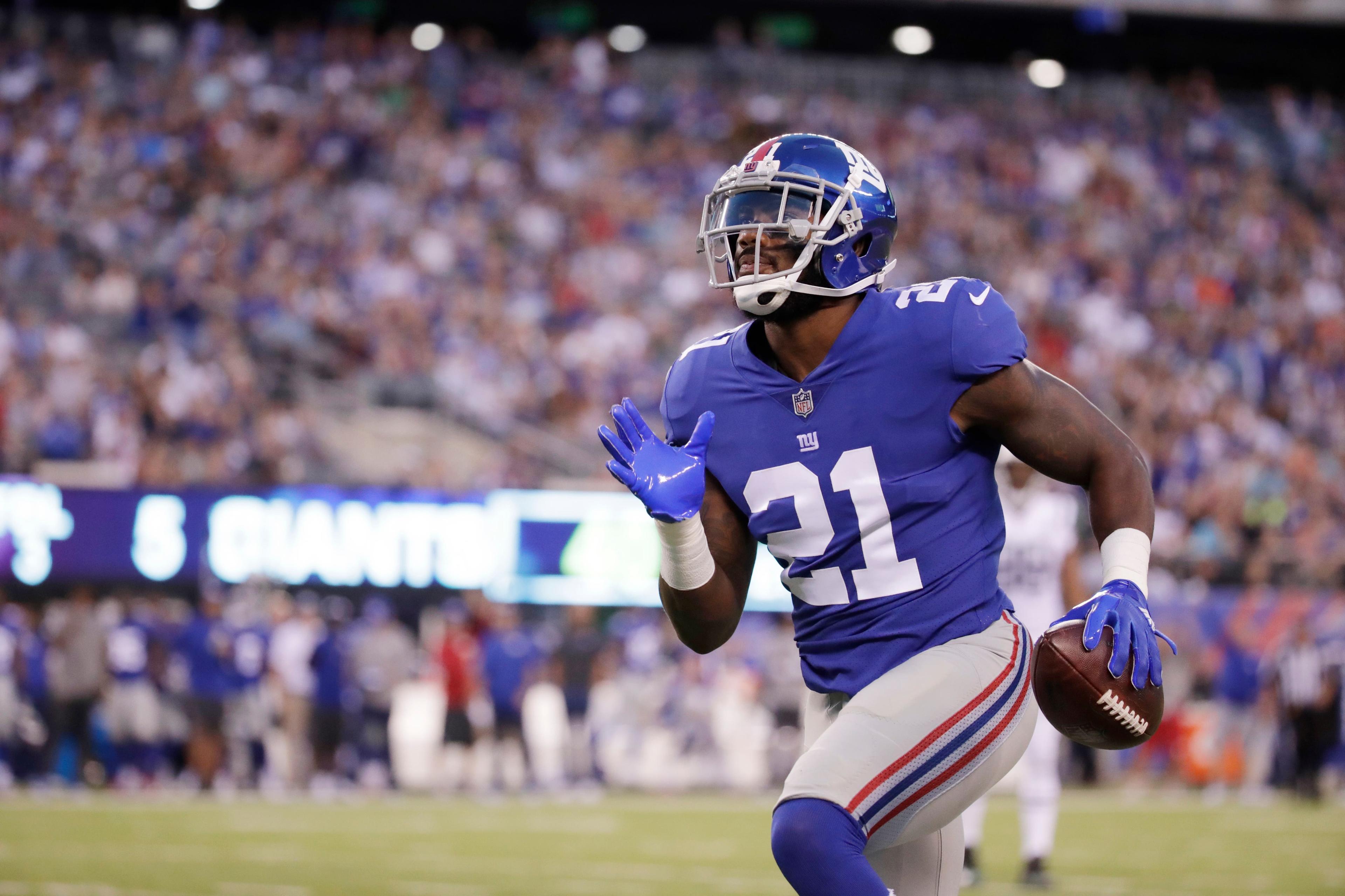 New York Giants' Landon Collins (21) returns an interception for a touchdown during the first half of a preseason NFL football game against the New York Jets Saturday, Aug. 26, 2017, in East Rutherford, N.J. (AP Photo/Julio Cortez) / Julio Cortez/AP